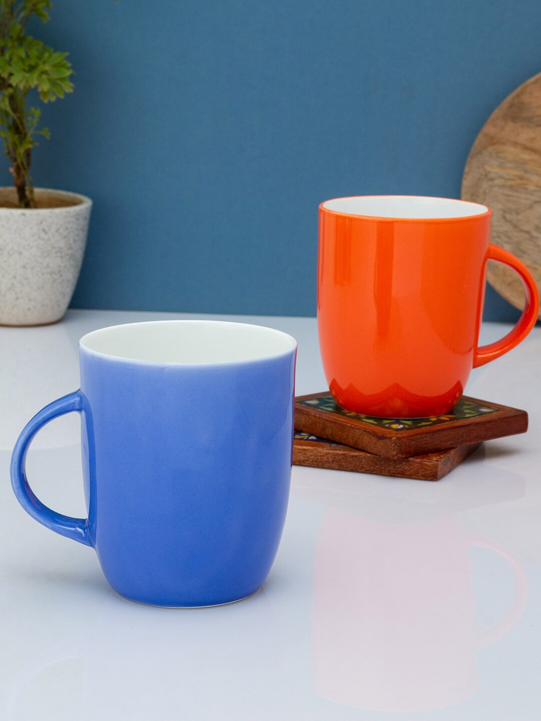CLAY CRAFT Navy Blue & Orange Solid Ceramic Glossy Mugs Set of Cups and Mugs Price in India