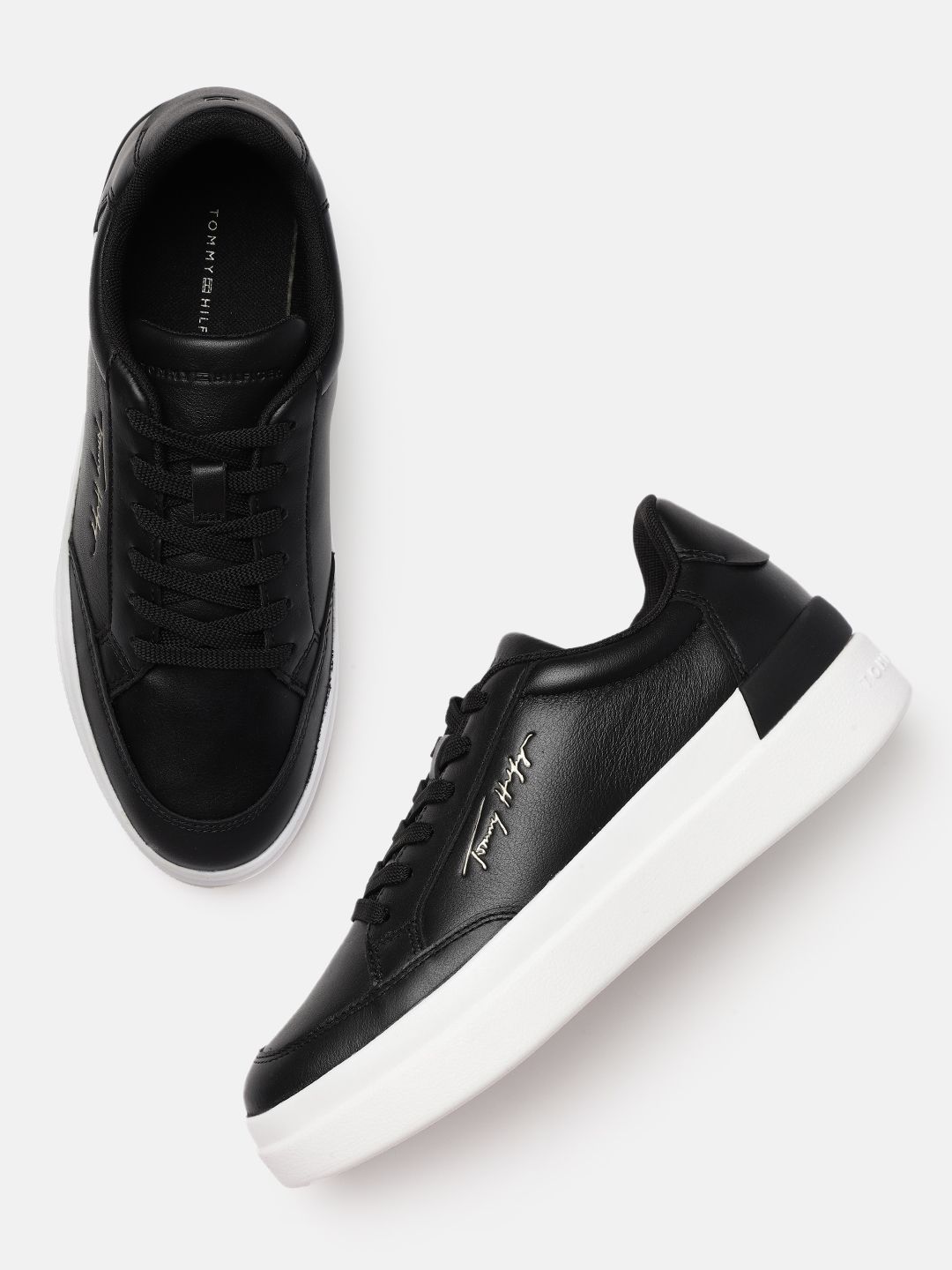 Tommy Hilfiger Women Black Solid Leather Regular Sneakers with Brand Logo Embossed Detail Price in India