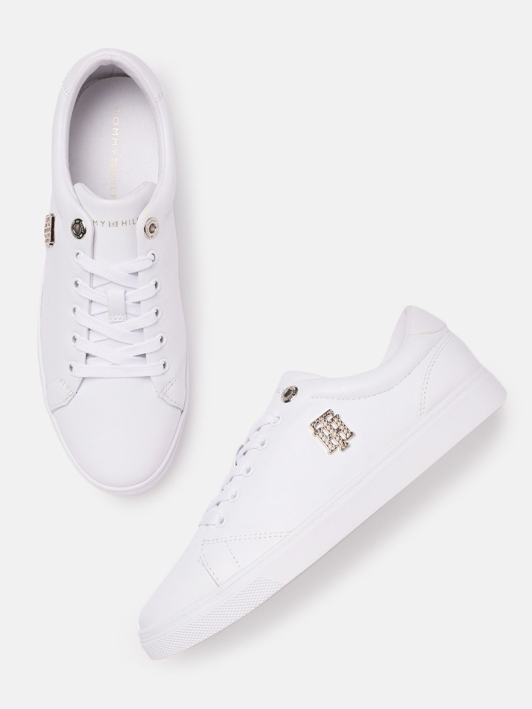 Tommy Hilfiger Women White Solid Leather Regular Sneakers with Brand Logo Applique Detail Price in India