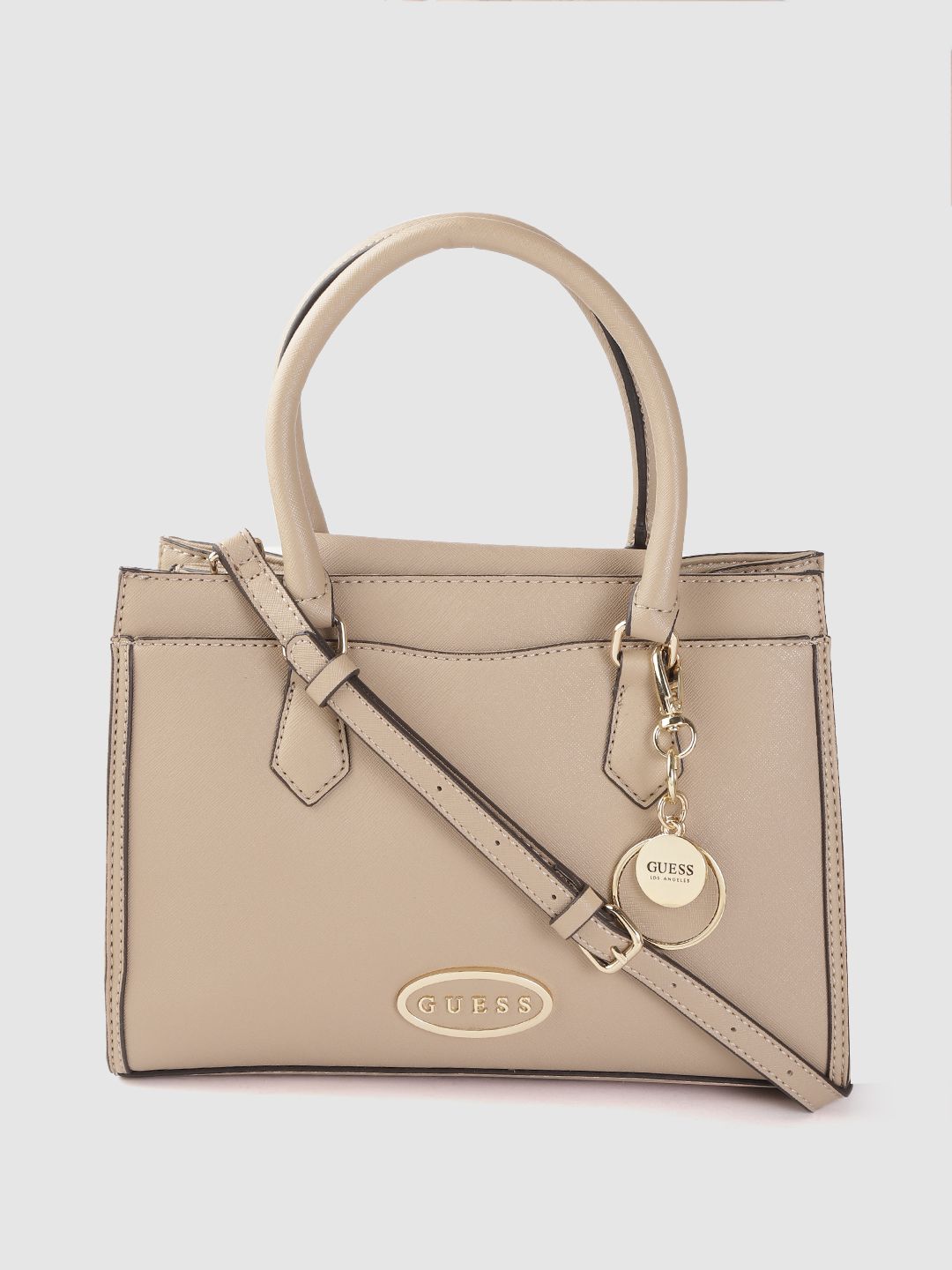 GUESS Beige Solid Structured Handheld Bag Price in India