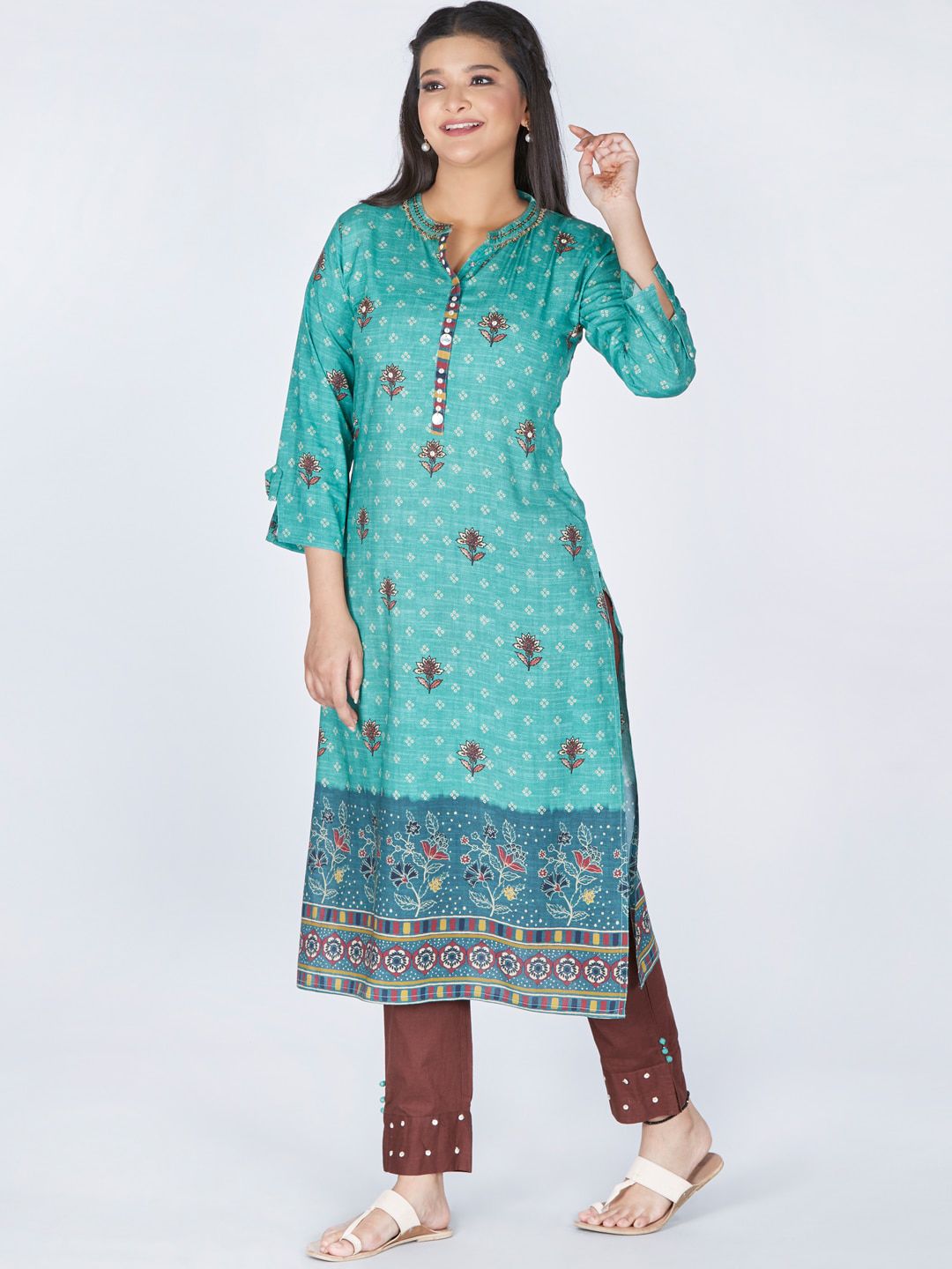 taruni Women Green Floral Printed Kurti with Trousers Price in India