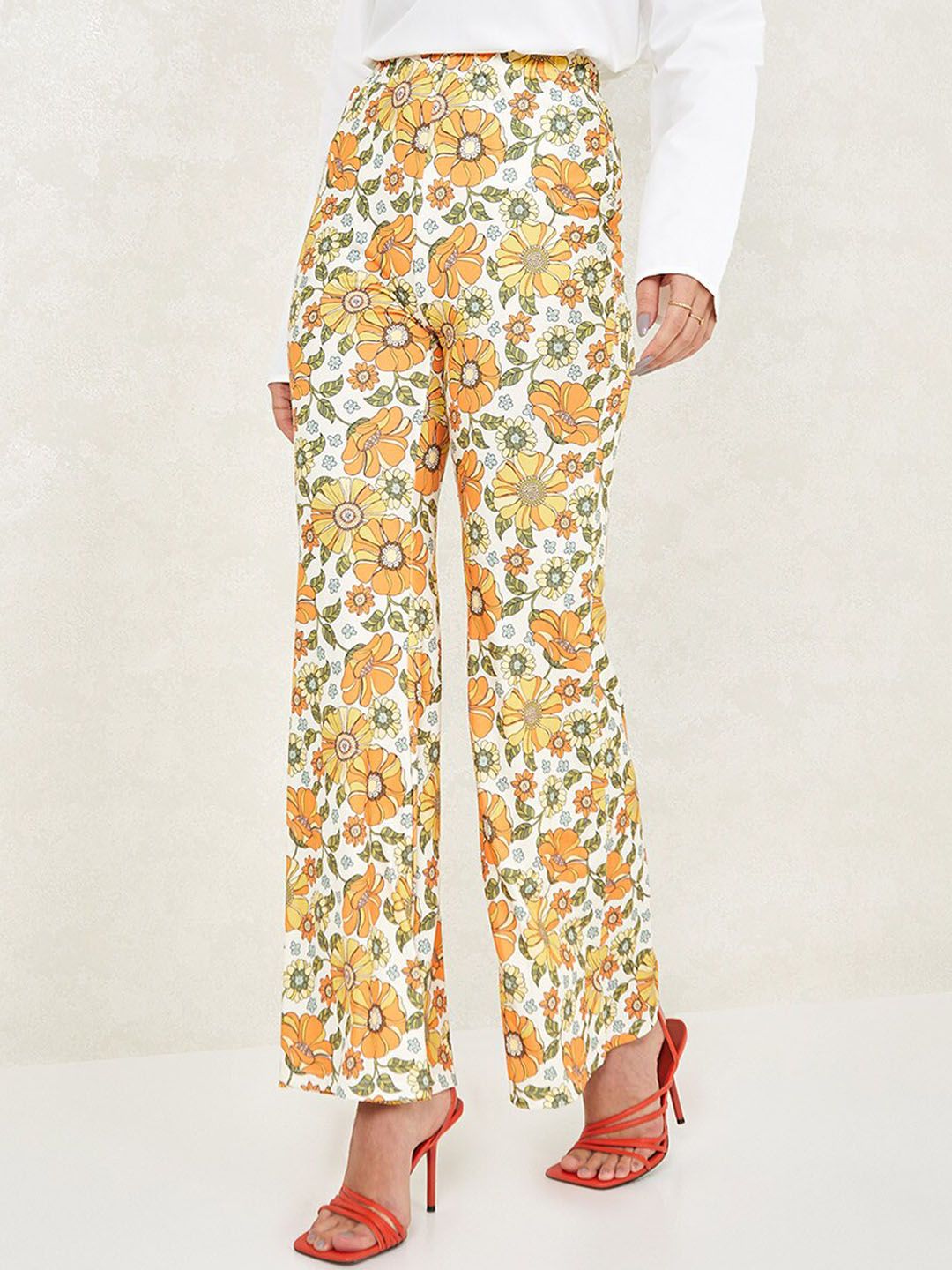 Styli Women Multicoloured Floral Printed Flared High-Rise Trousers Price in India