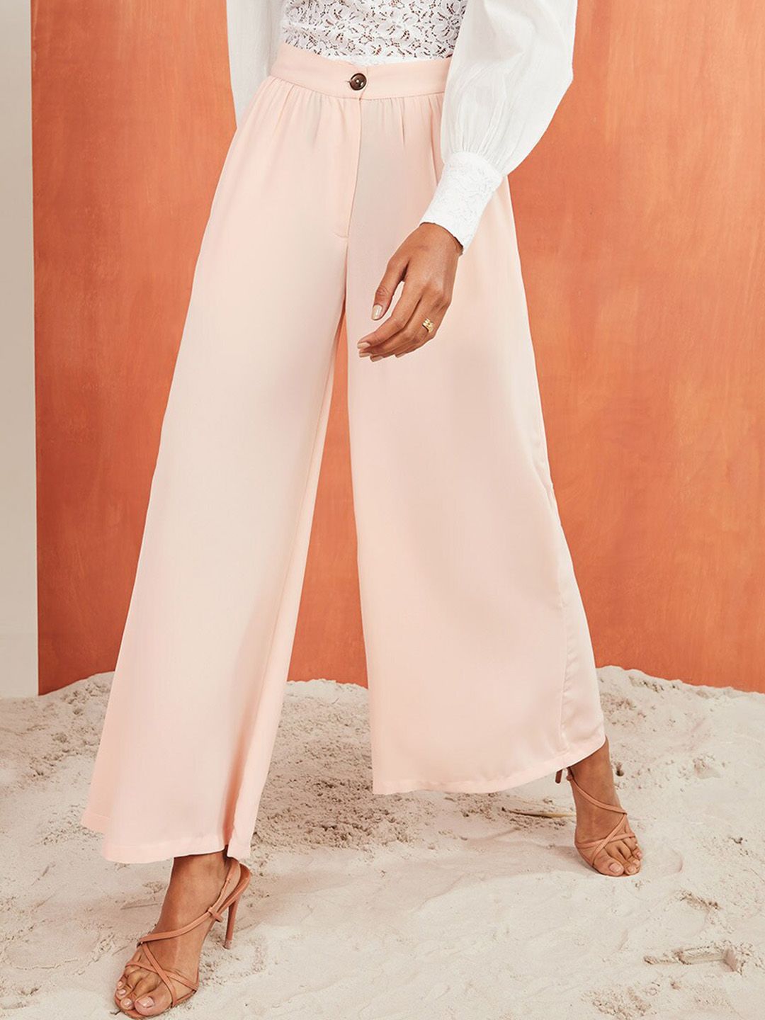 Styli Women Pink Flared High-Rise Trousers Price in India