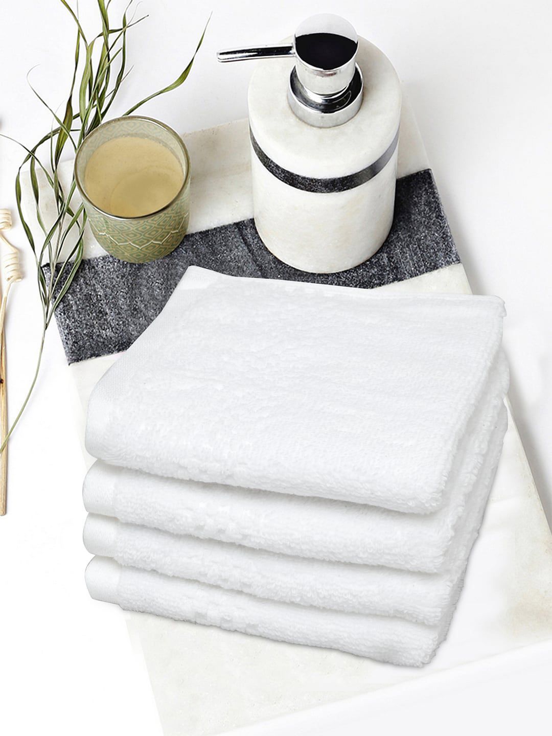 SPACES Set Of 4 White Solid 450 GSM Pure Cotton Face Towels Price in India