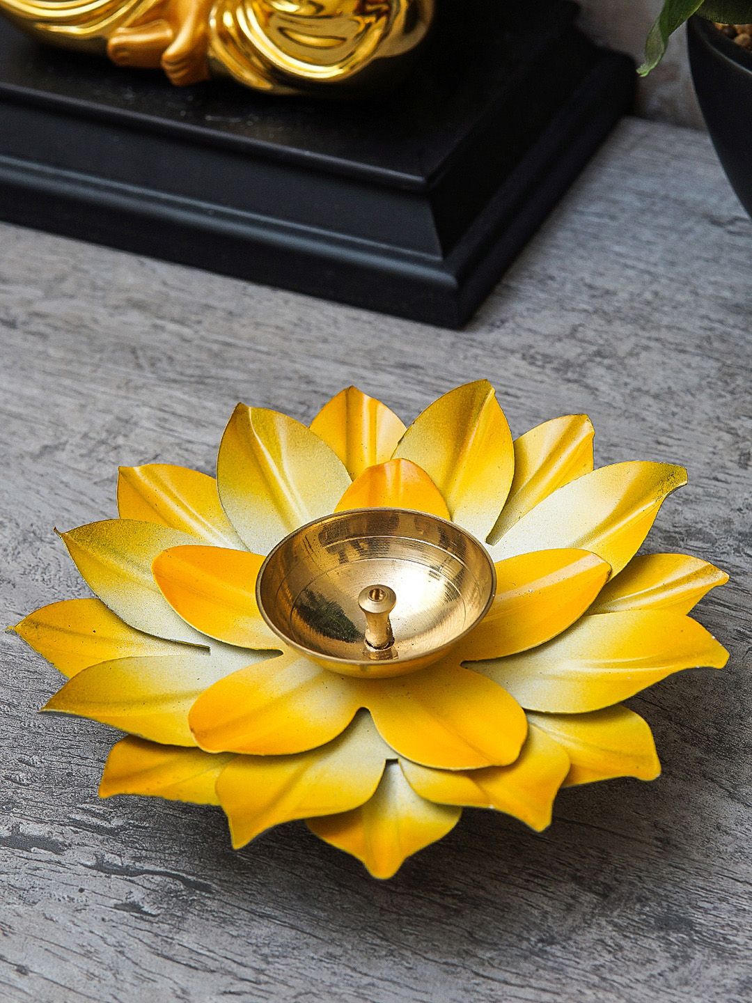 StatueStudio Yellow Lotus Shaped Diya Pooja Essentials Price in India