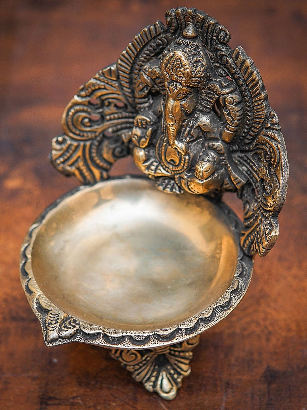 StatueStudio Gold-Toned Ganesha Diya Pooja Essentials Price in India