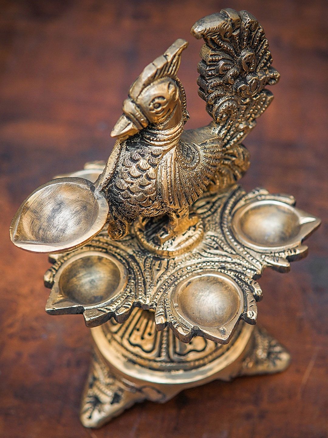 StatueStudio Gold-Toned Peacock Bird Diya Price in India