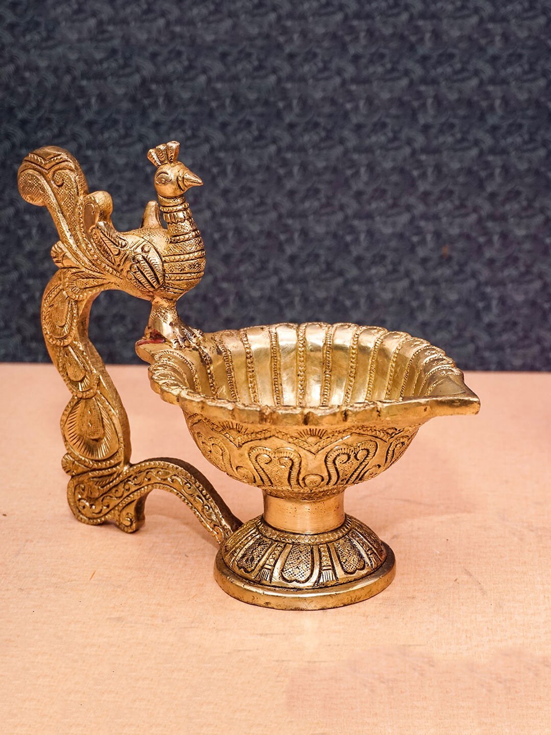 StatueStudio Gold Brass Antique Peacock Bird Diya Price in India