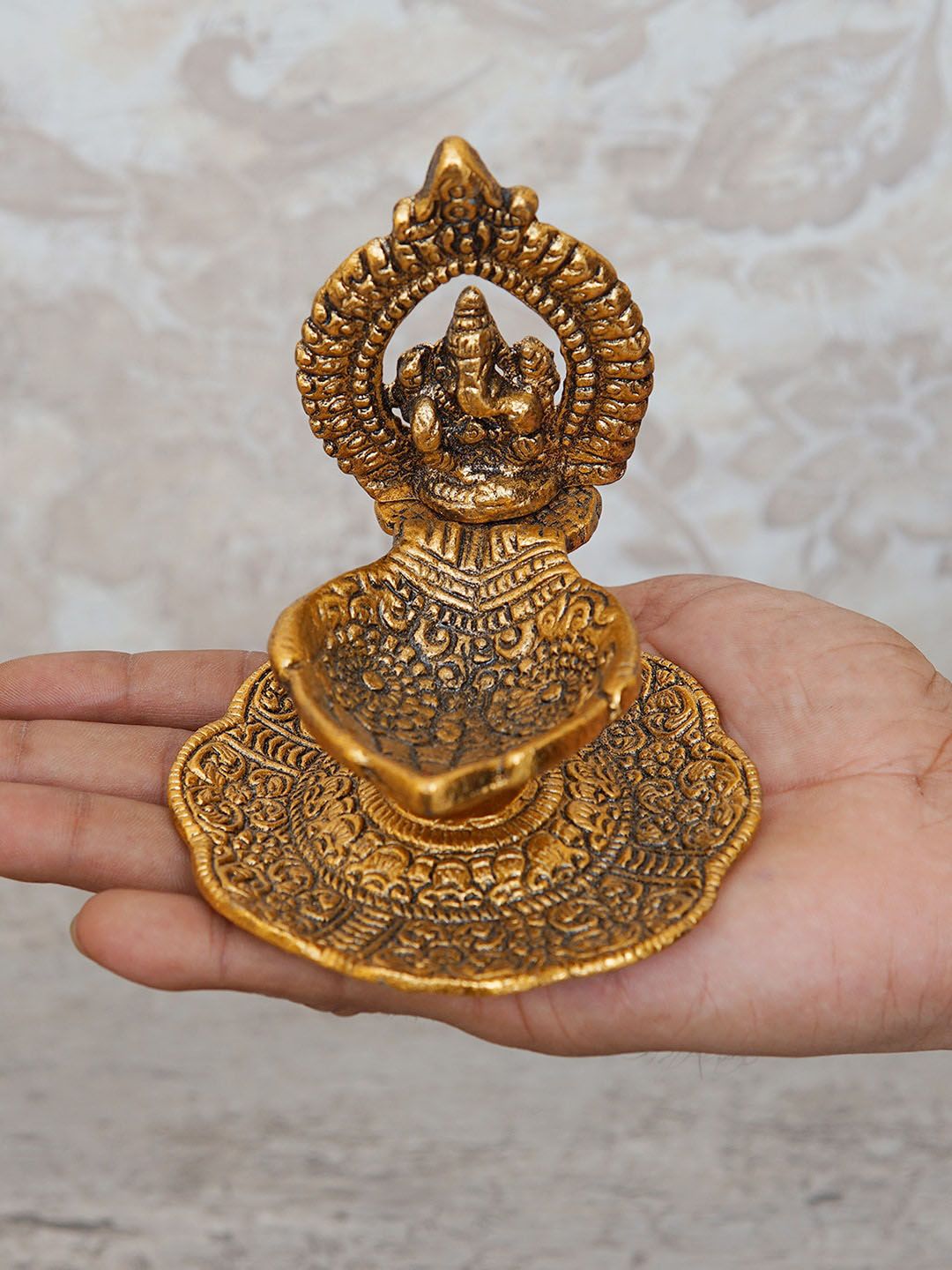 StatueStudio Gold-Toned Textured Ganesha Diya Price in India