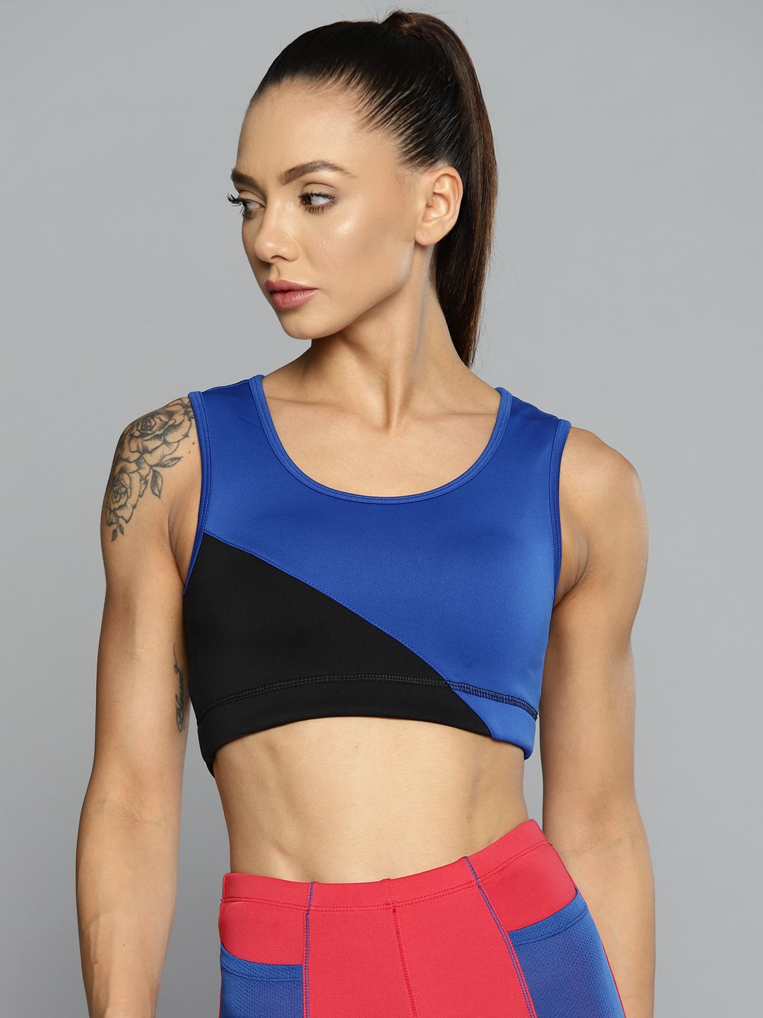 Alcis Women Blue & Black Colourblocked Sports Bra Price in India