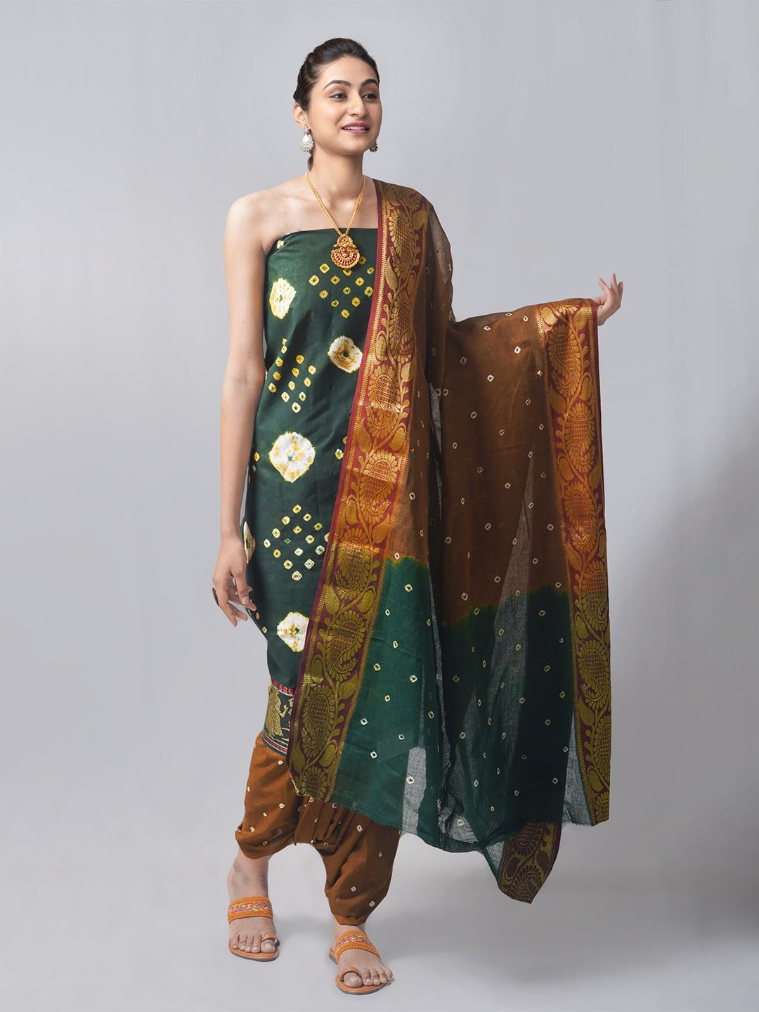 Unnati Silks Green & Brown Dyed Pure Cotton Unstitched Dress Material Price in India