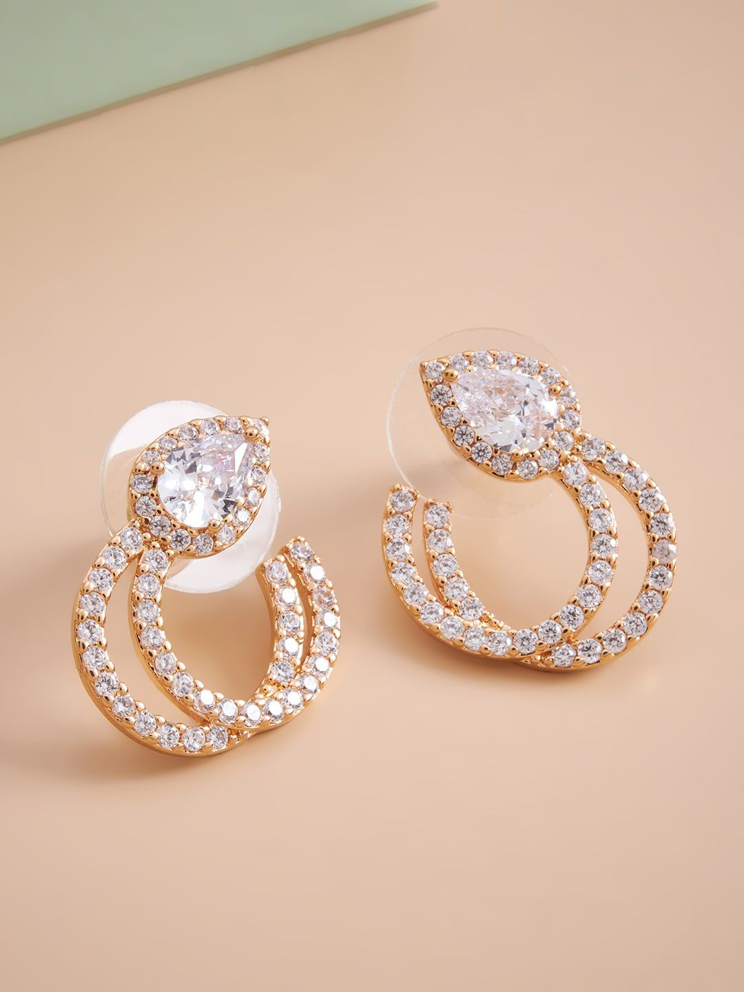 Kushal's Fashion Jewellery White Teardrop Shaped Studs Earrings Price in India
