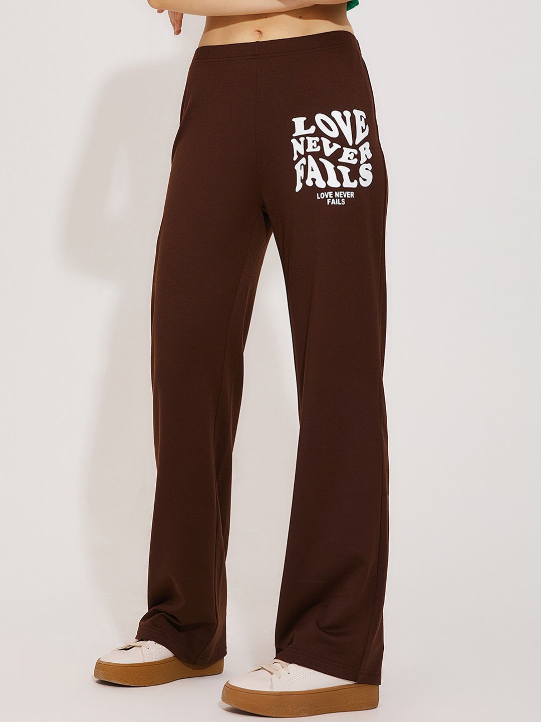 URBANIC Women Brown Printed Trousers Price in India