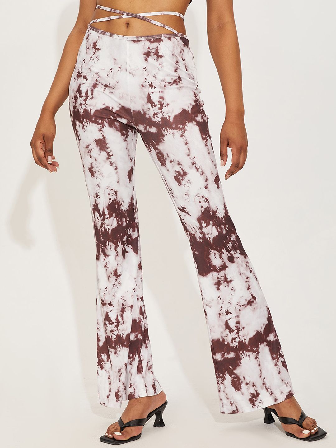 URBANIC Women Coffee Brown Floral Printed Trousers Price in India