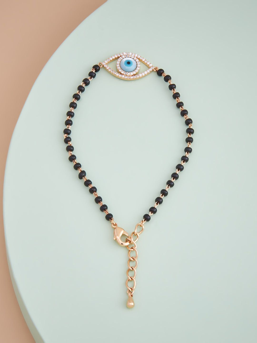 Kushal's Fashion Jewellery Women Black Cubic Zirconia Gold-Plated Wraparound Bracelet Price in India