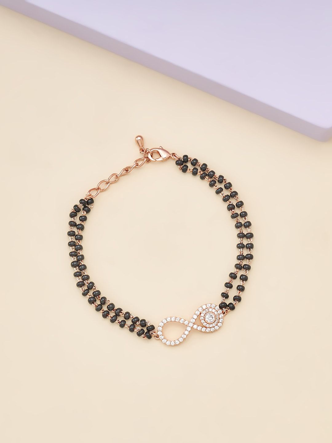 Kushal's Fashion Jewellery Women Rose Gold & White Cubic Zirconia Rose Gold-Plated Link Bracelet Price in India