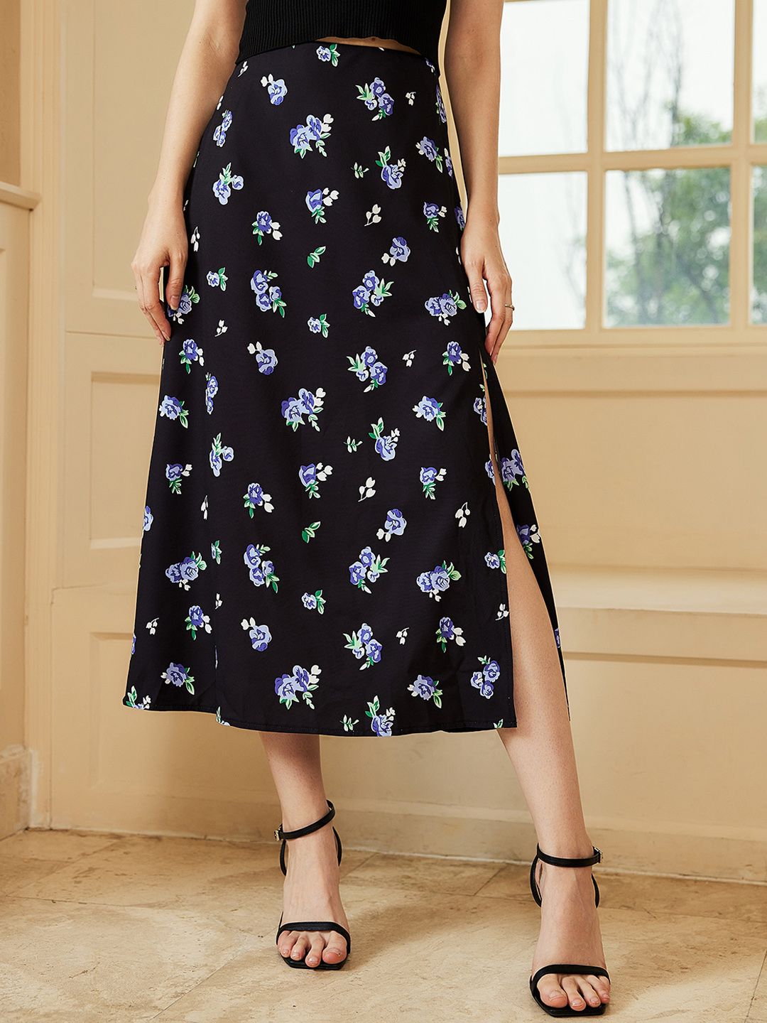 URBANIC Women Black Printed A-Line Midi Skirts