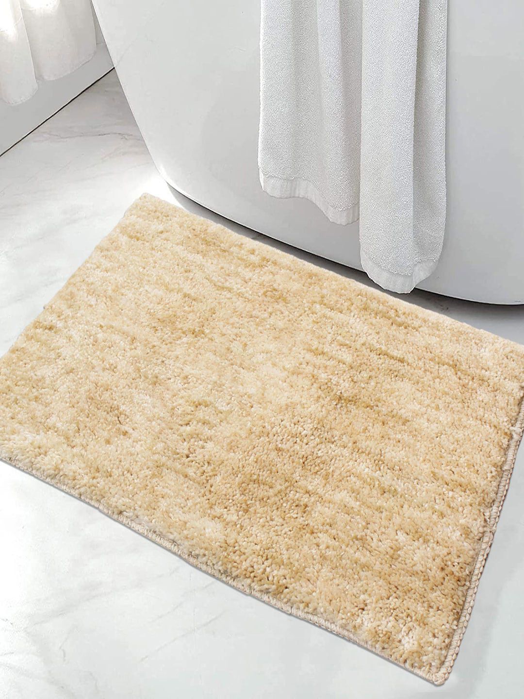 LUXEHOME INTERNATIONAL Beige Solid Microfibre 1600 GSM Bath Rug Price in India