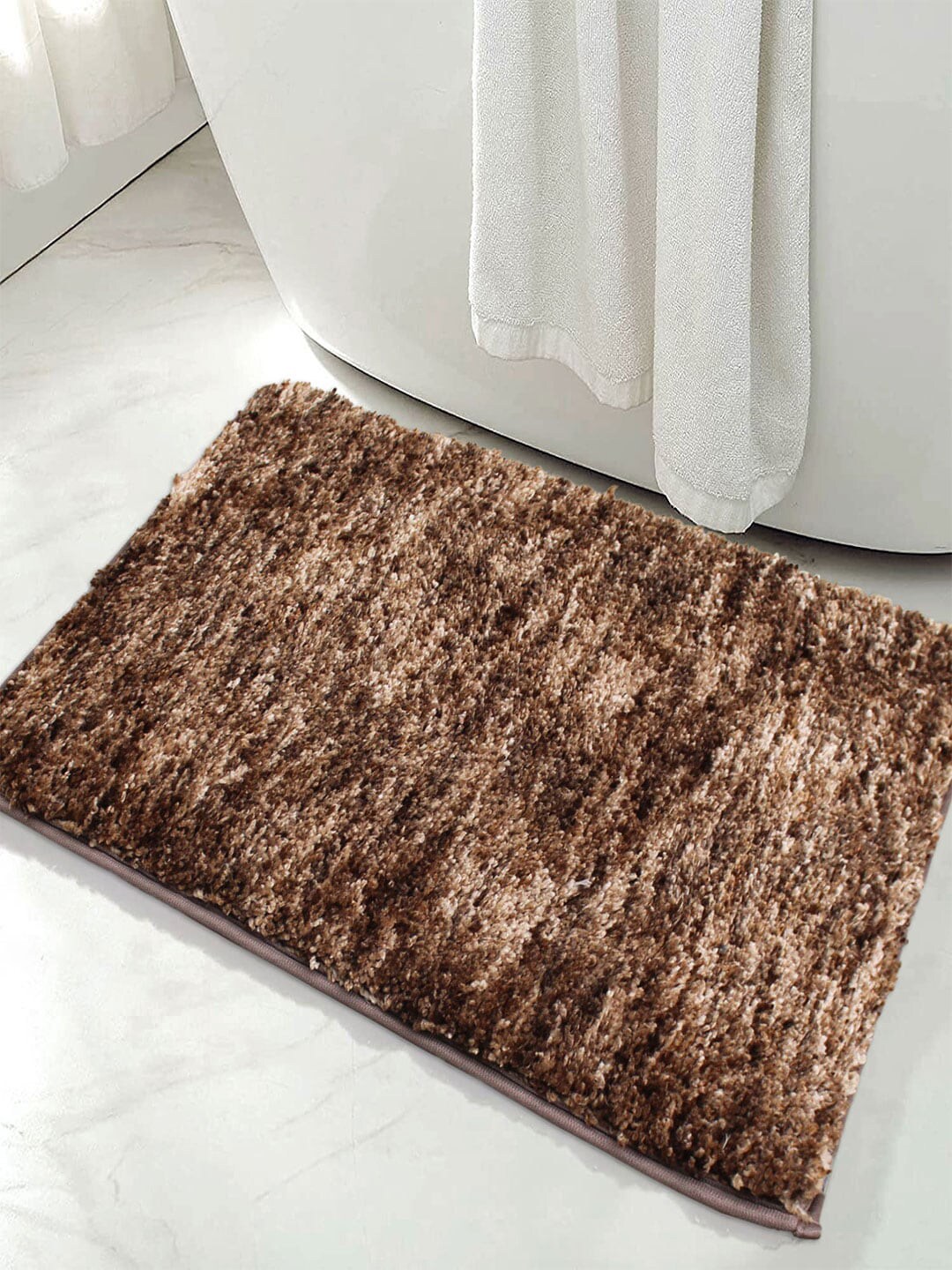 LUXEHOME INTERNATIONAL Brown Textured 1780 GSM Bath Rugs Price in India