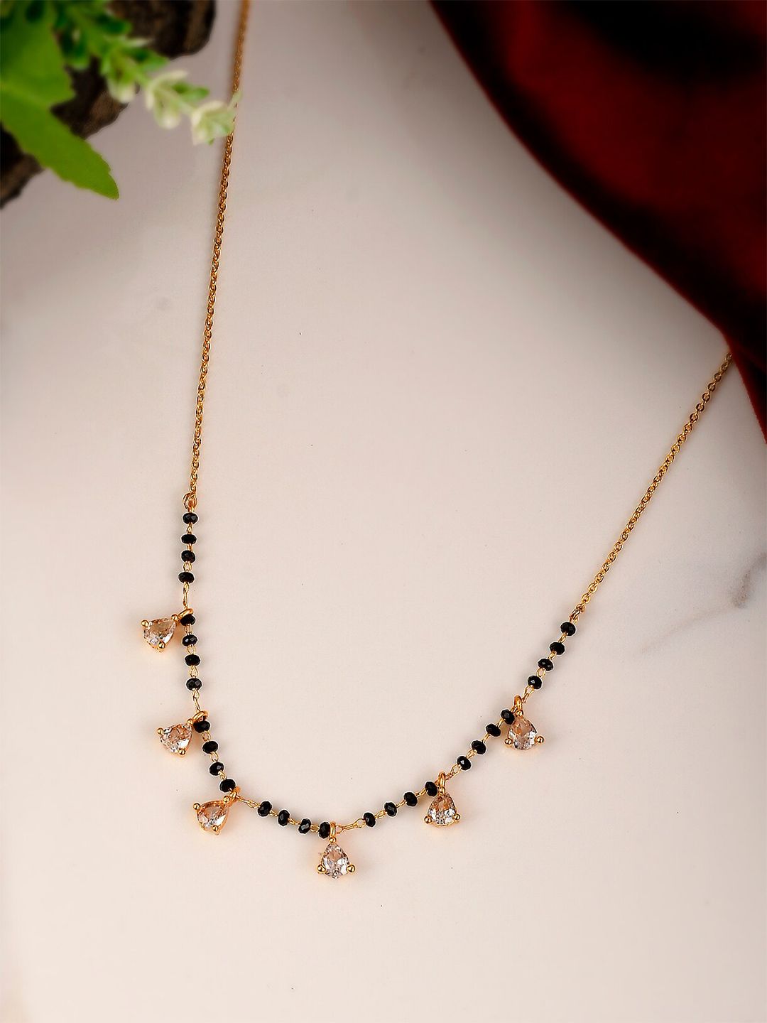 Shoshaa Gold-Toned & Black Brass Gold-Plated Handcrafted Necklace Price in India