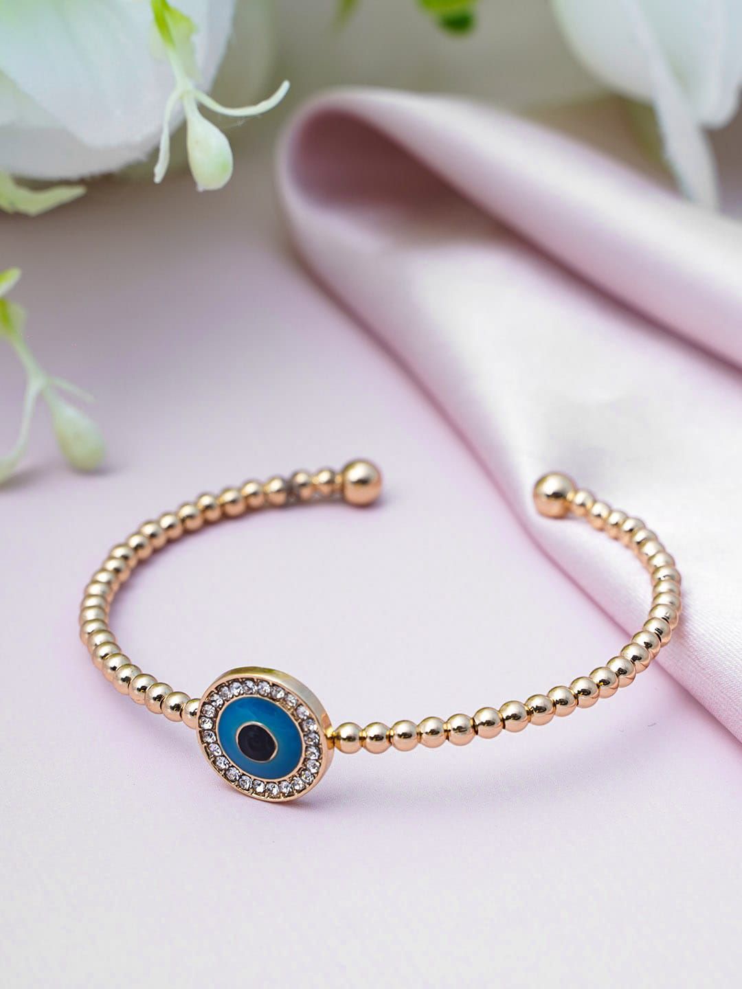 Ferosh Women Gold-Toned & Blue Evil Eye Slip-On Cuff Bracelet Price in India