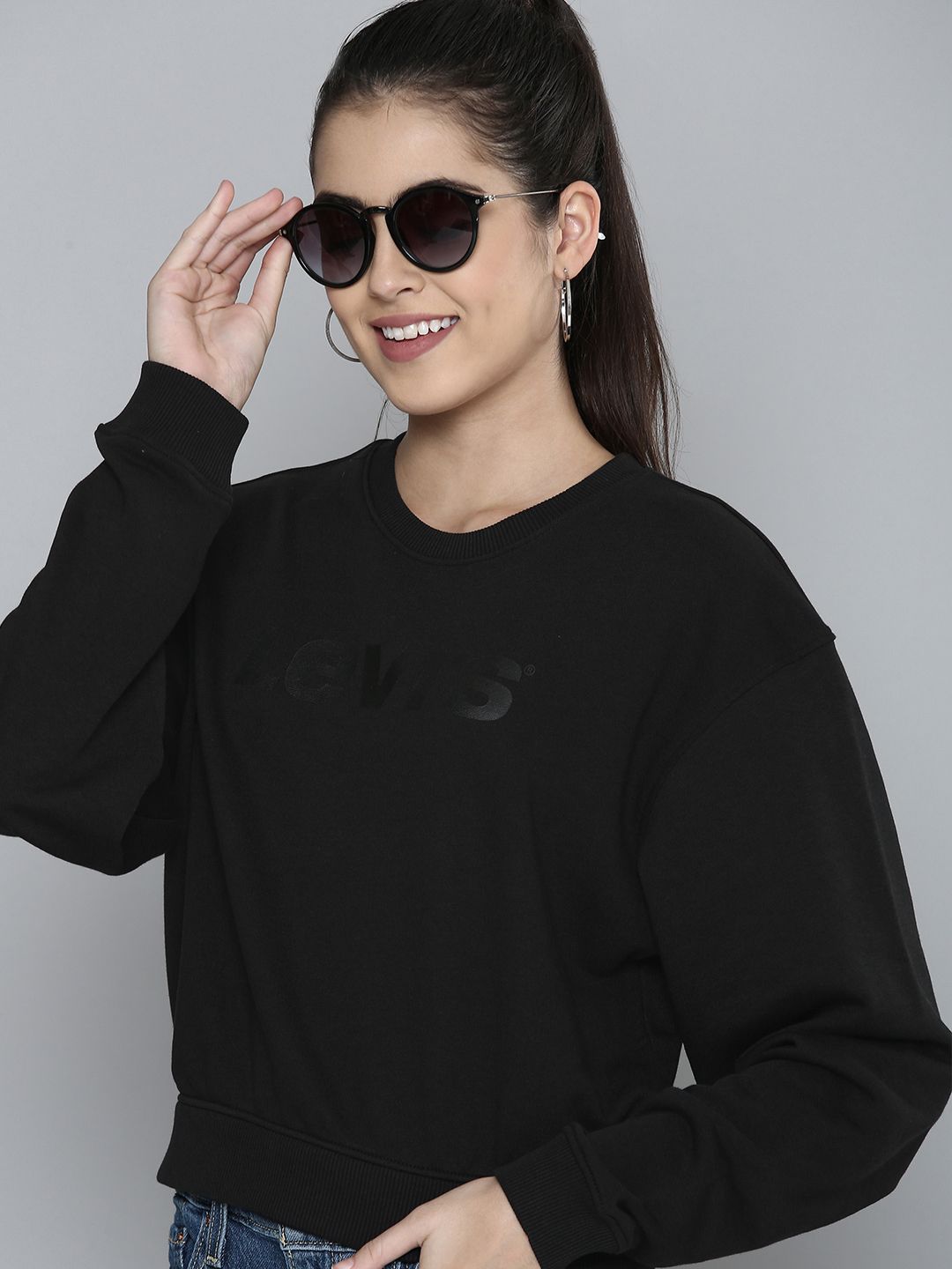 Levis Women Black Solid Pullover Sweatshirt Price in India