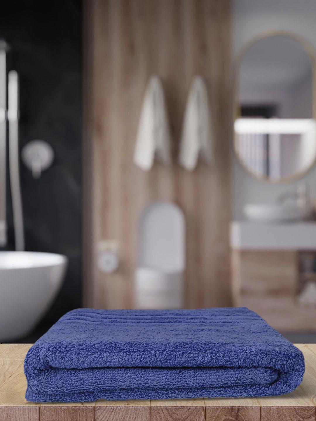 Monte Carlo Blue Solid 525 GSM Pure Cotton Bath Towel Price in India