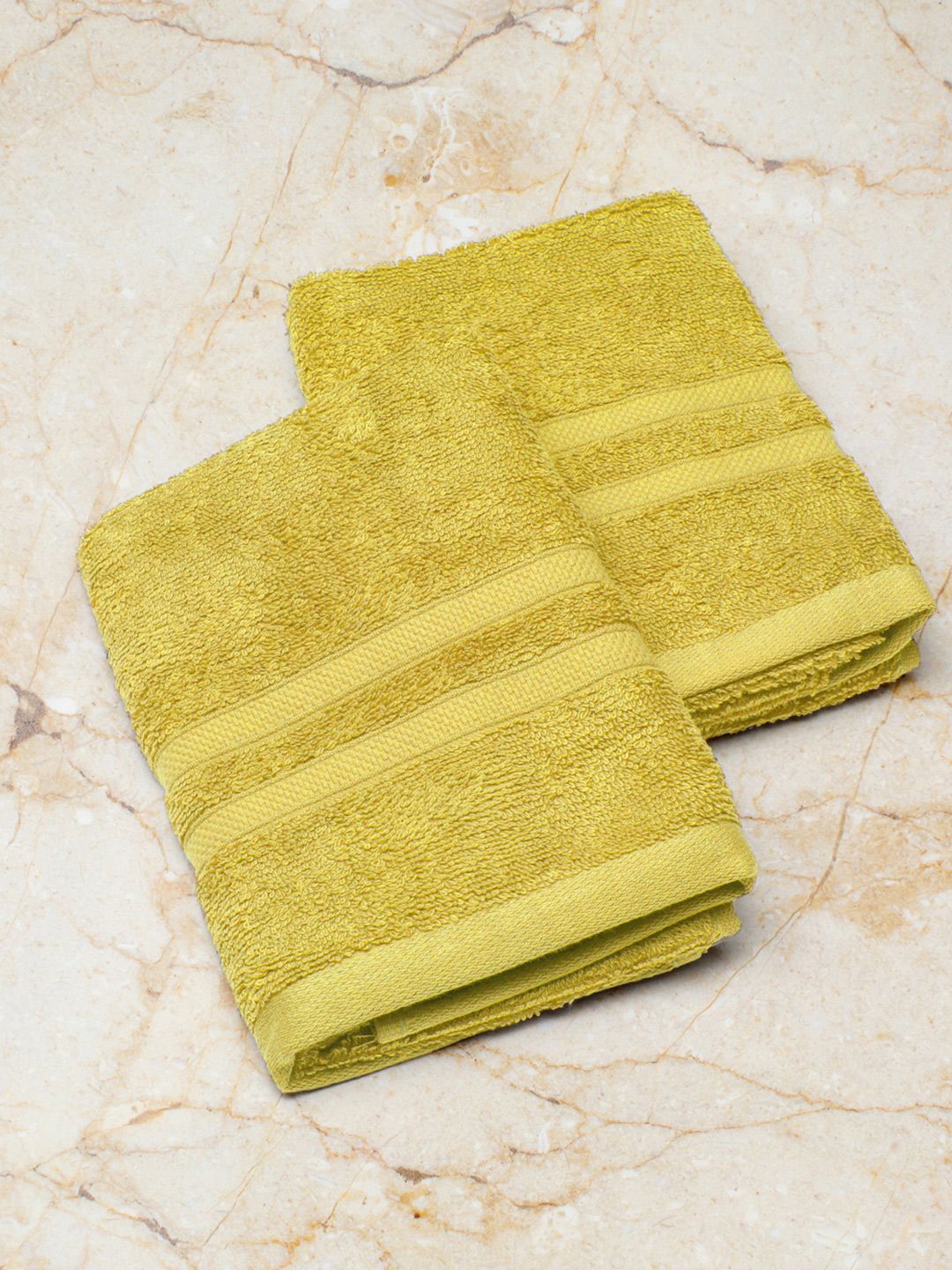 Monte Carlo Set Of 2 Yellow Solid Pure Cotton 525 GSM Hand Towels Price in India