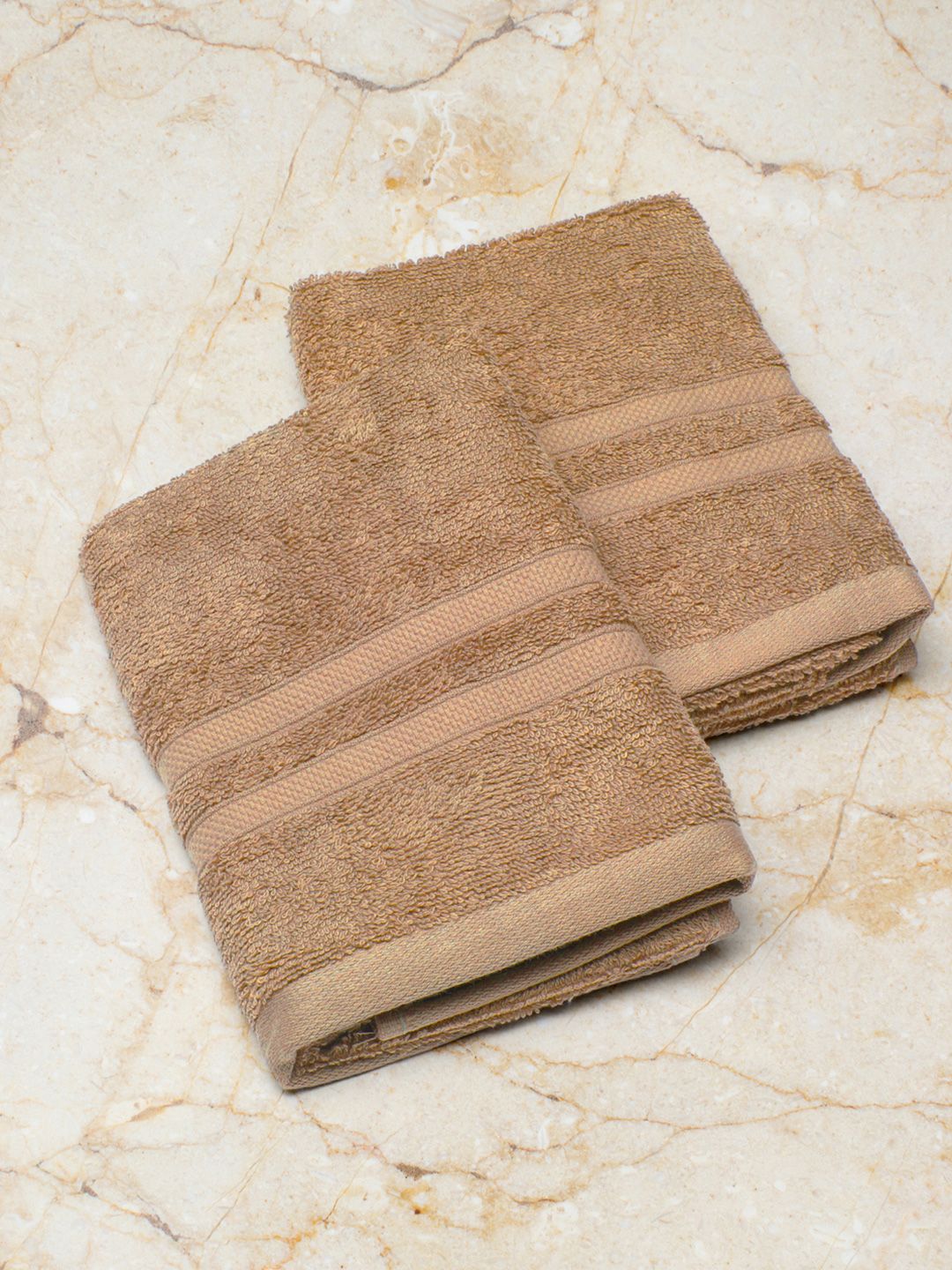 Monte Carlo Unisex Beige 520 GSM Set of 2 Cotton Solid Hand Towel Price in India