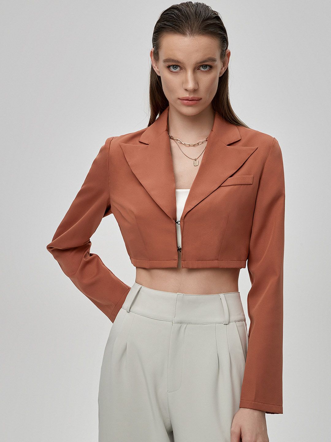 URBANIC Women Orange Solid Cropped Single-Breasted Blazer Price in India