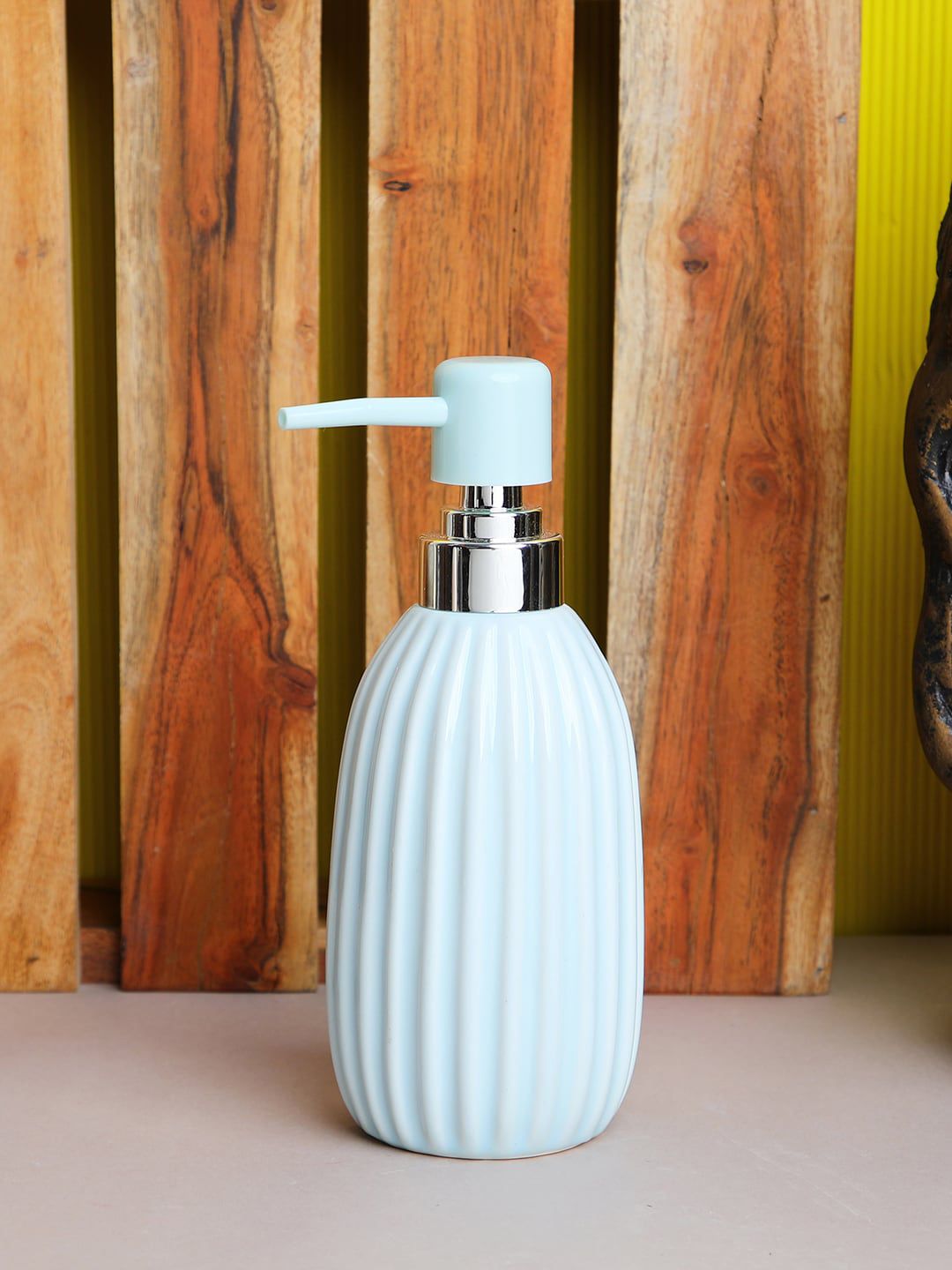 ROMEE Blue Textured Ceramic Soap Dispenser Price in India