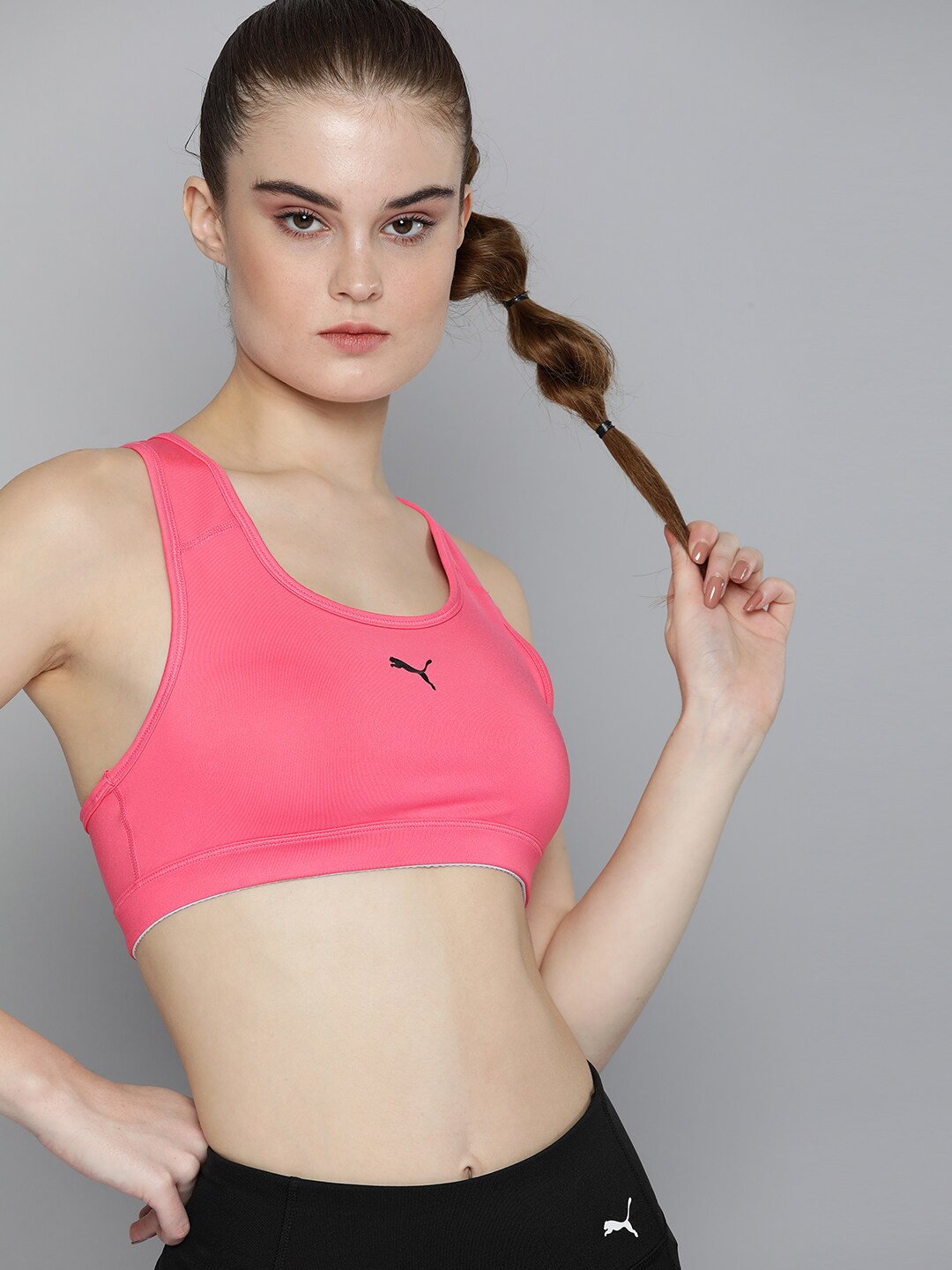 Puma Women Pink dryCELL Mid Impact Sports Bra 52030482 Price in India