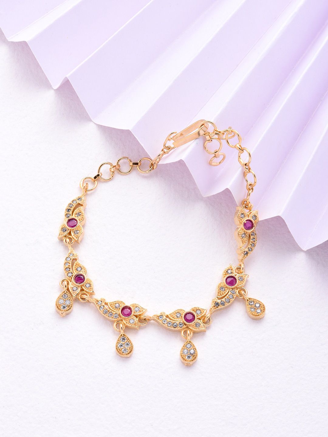 Fida Women Gold-Toned & Purple Brass American Diamond Handcrafted Gold-Plated Wraparound Bracelet Price in India