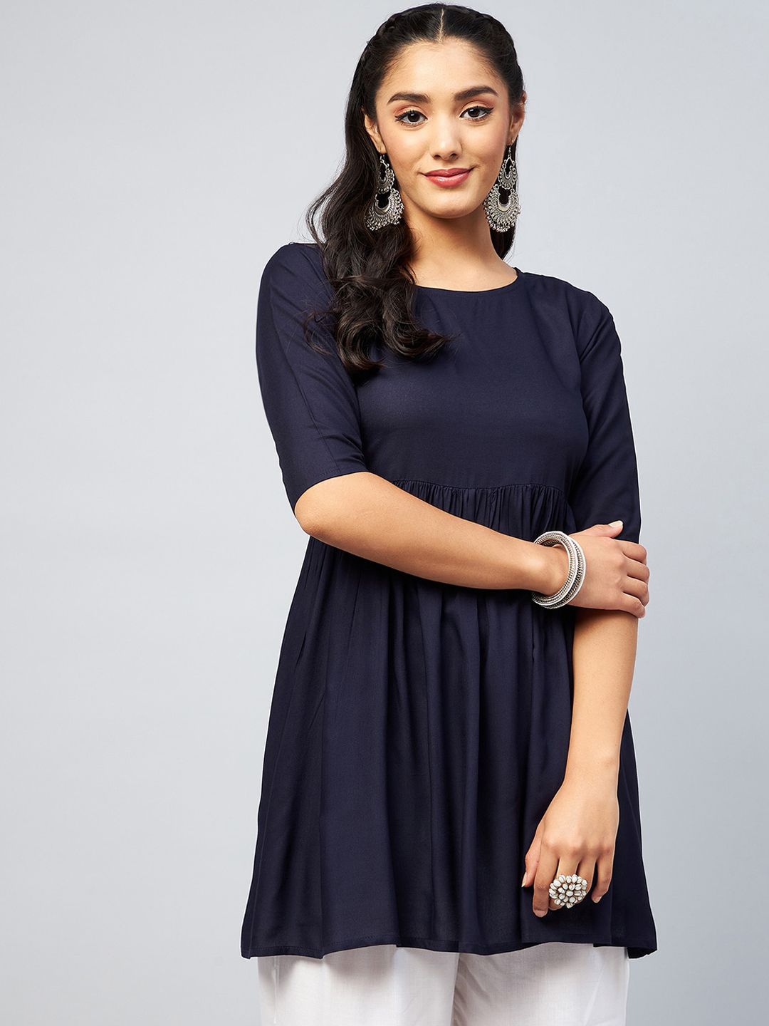 InWeave Navy Blue Empire Solid Kurti Price in India