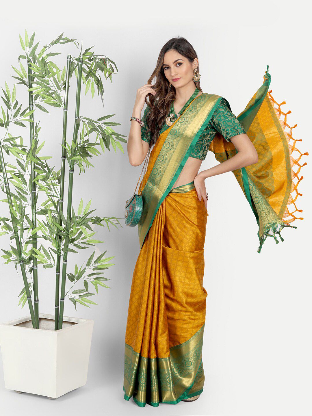 Mitera Orange & Green Ethnic Motifs Zari Mysore Silk Saree Price in India