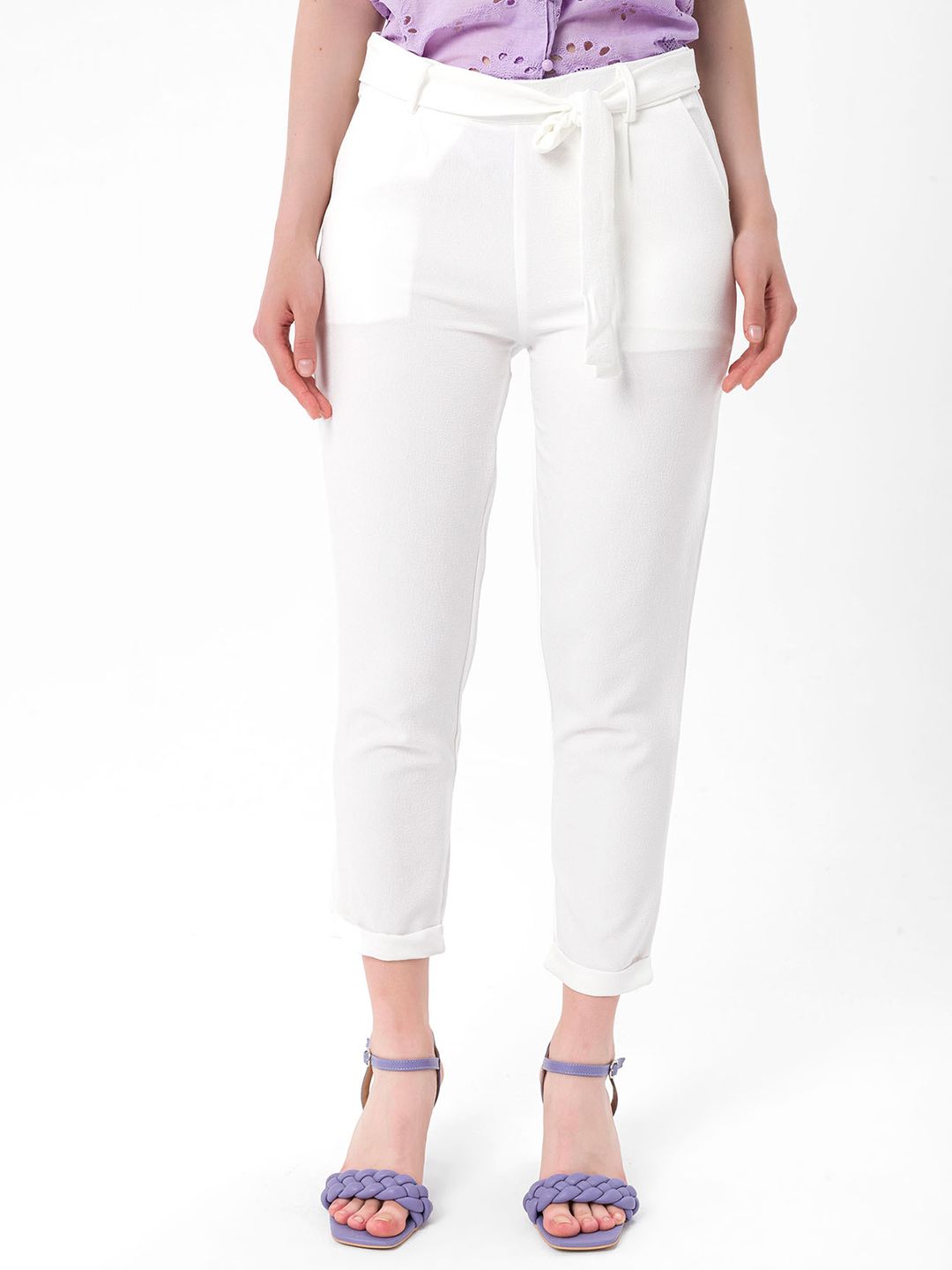 bebe PLUS Women White Solid Textured Mid-Rise Knitted Trousers Price in India