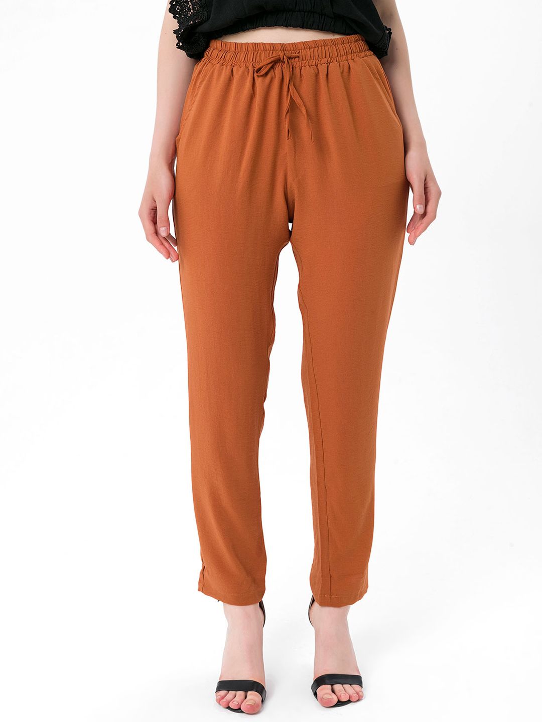 bebe PLUS Women Rust Orange Solid Pleated Trousers Price in India