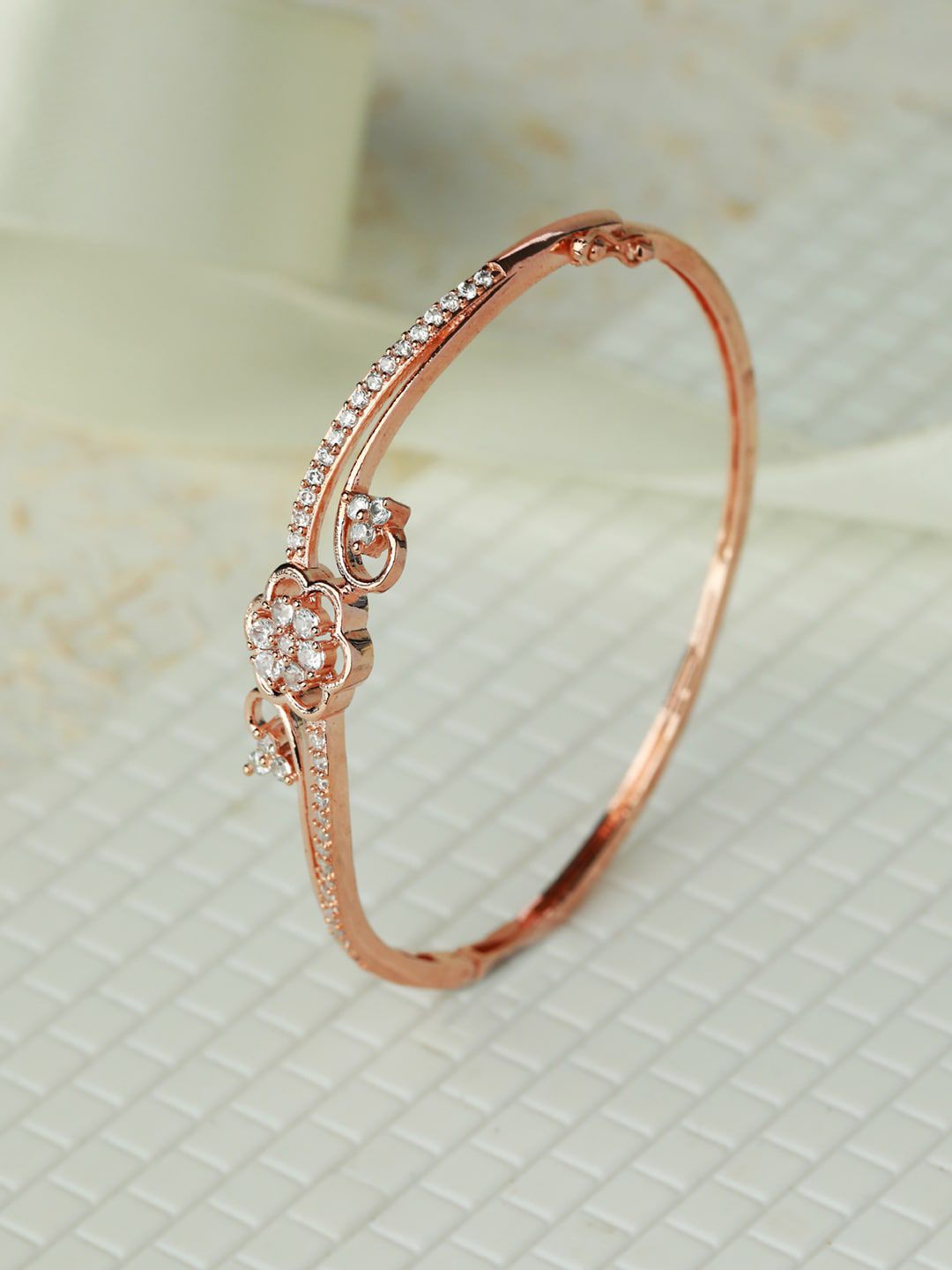 Priyaasi Women Rose Gold-Plated Brass American Diamond Bangle-Style Bracelet Price in India