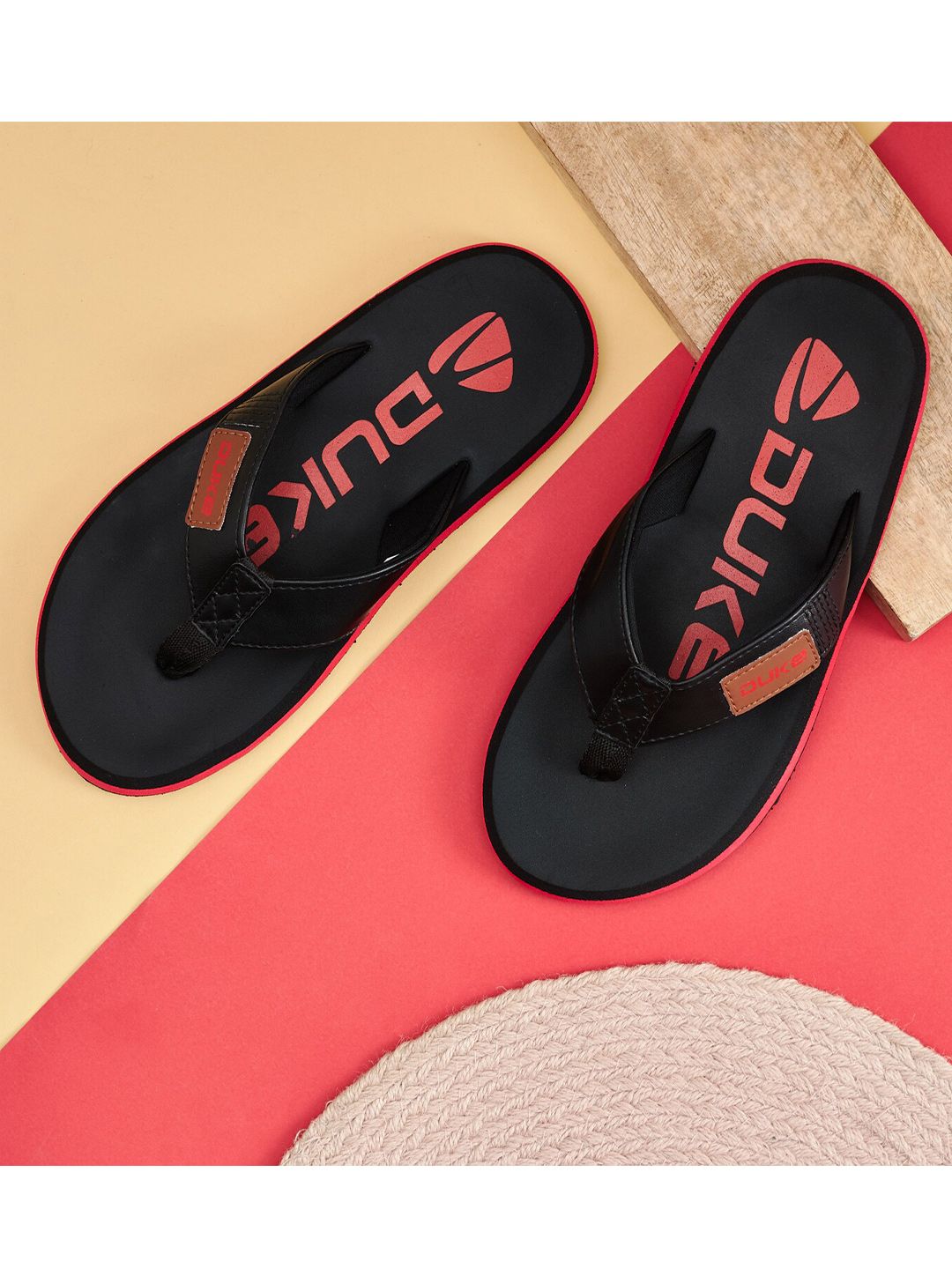 Duke Men Black & Orange Printed Thong Flip-Flops