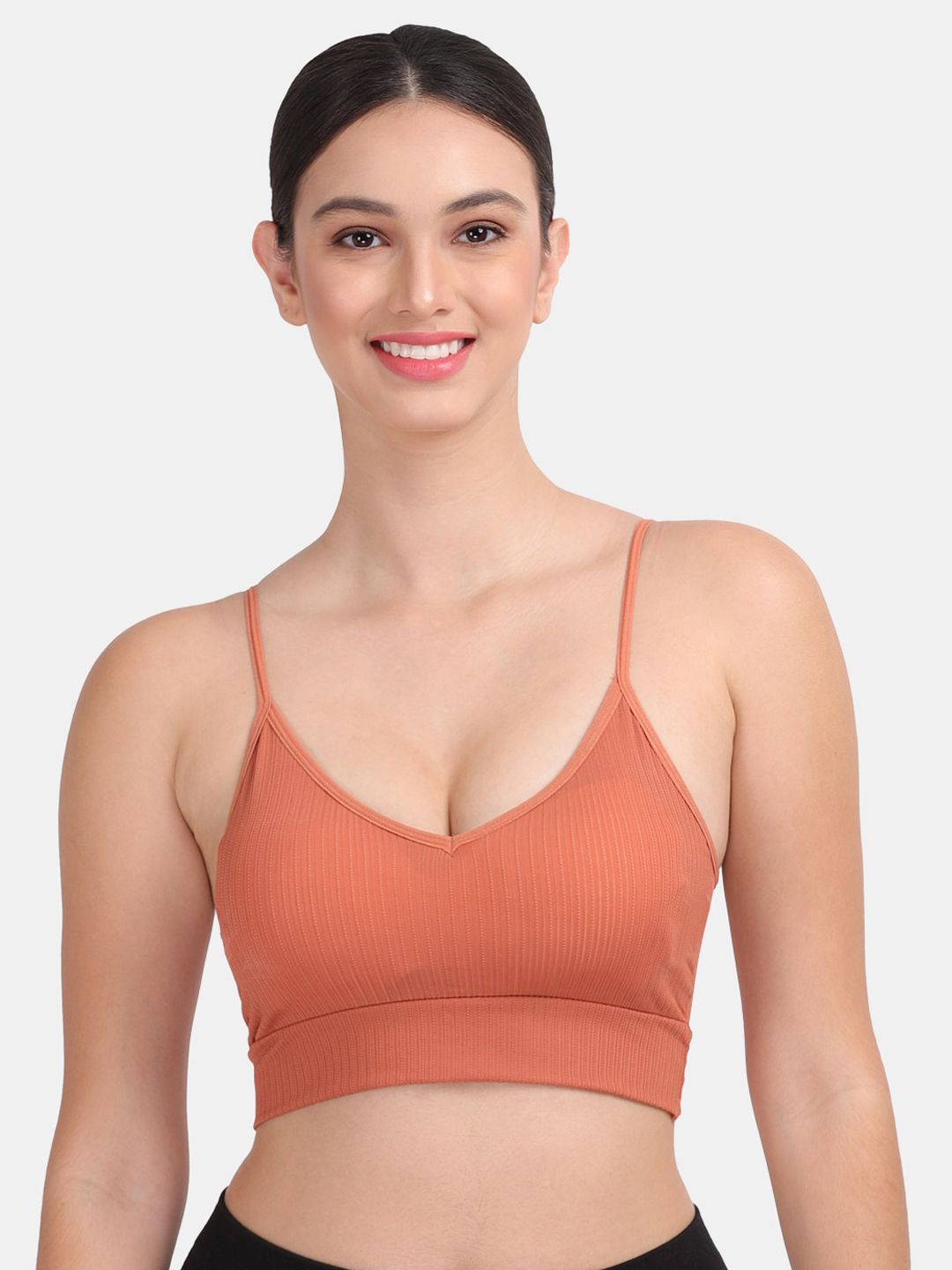 Amour Secret Rust Orange Non Padded & Non Wired Dry Fit Solid Workout Bra Price in India