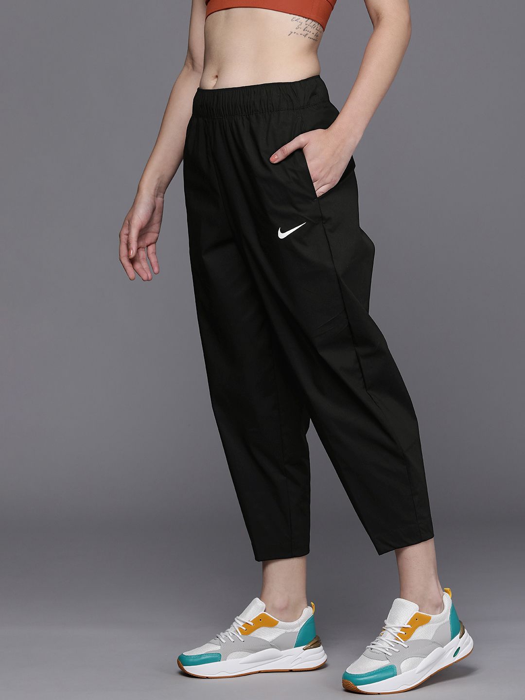 Nike Women Black Solid Essential High-Rise Curve Cropped Track Pants Price in India