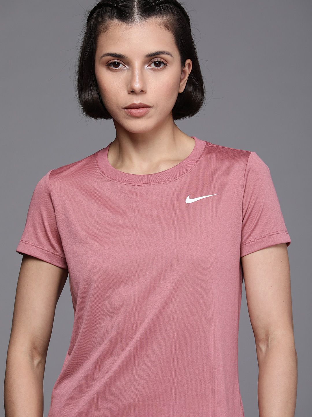 Nike Women Pink Solid Dri-FIT Training T-shirt Price in India
