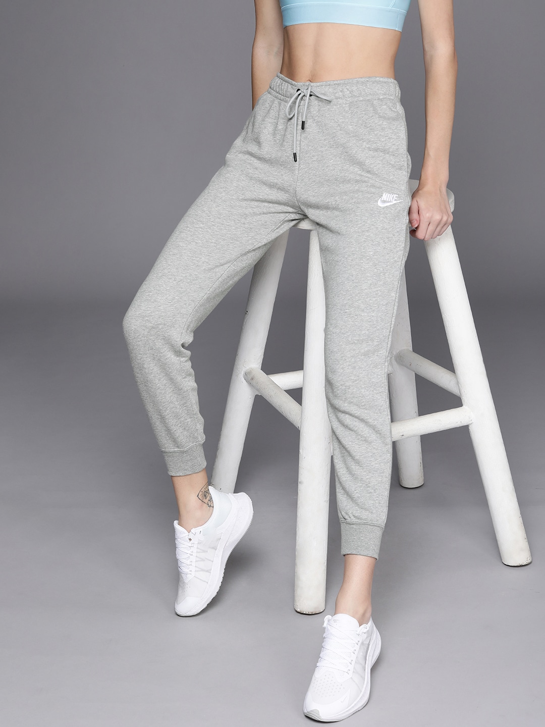Nike Sportwear Women Grey Melange Solid Essential Fleece Regular Fit Joggers Price in India