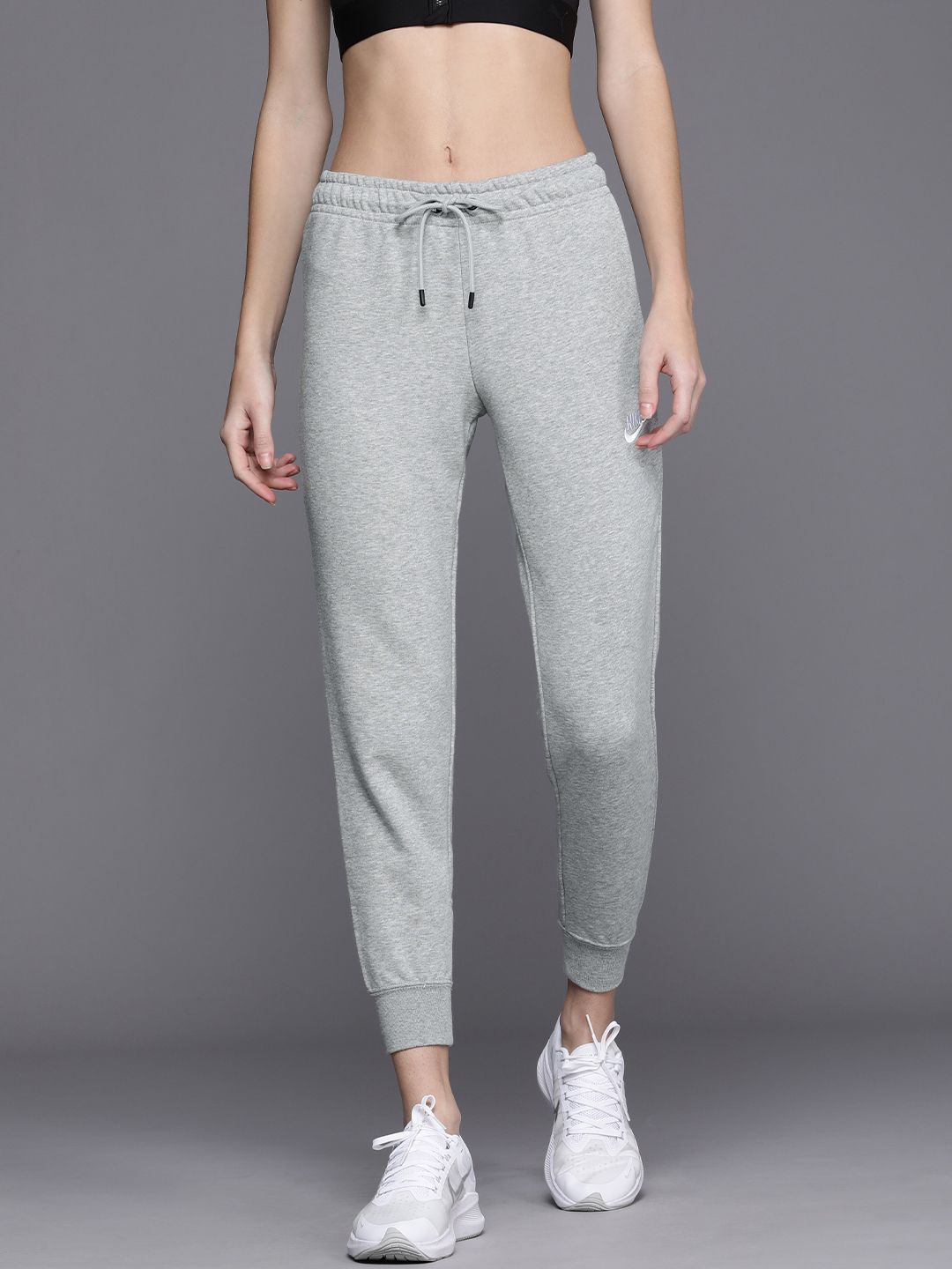 Nike Women Grey Melange Solid Essential Fleece Tight Fit Joggers Price in India