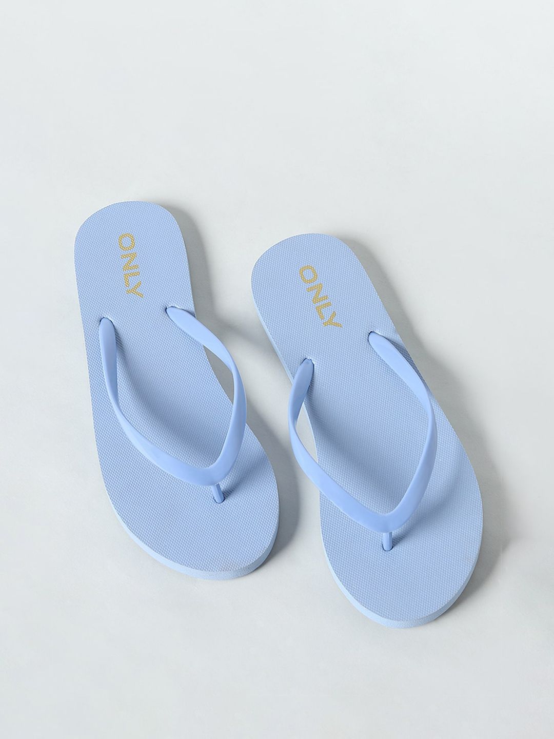 ONLY Women Blue & Gold-Toned Printed Rubber Thong Flip-Flops Price in India