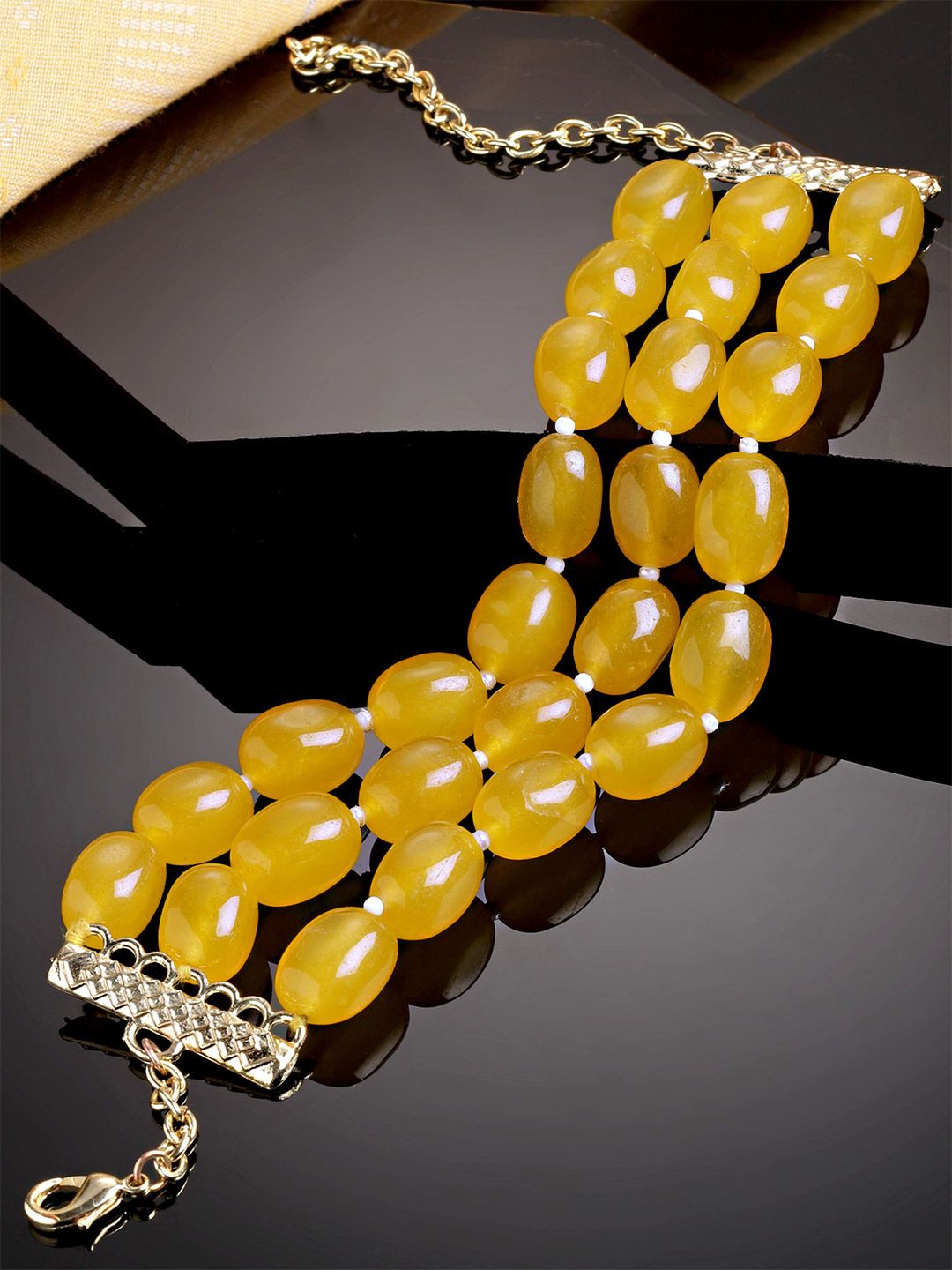KARATCART Women Yellow Tumble Stone Beaded Bracelet Price in India