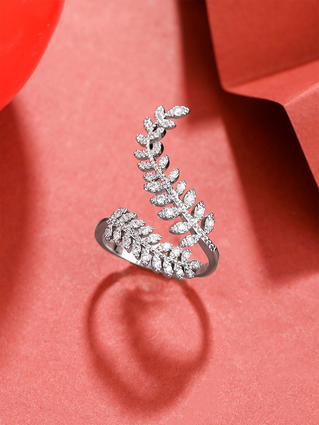 Toned Leafy White Crystal-Studded Finger Ring Yellow Chimes Silver Toned Leafy White Crystal-Studded Adjustable Finger Ring