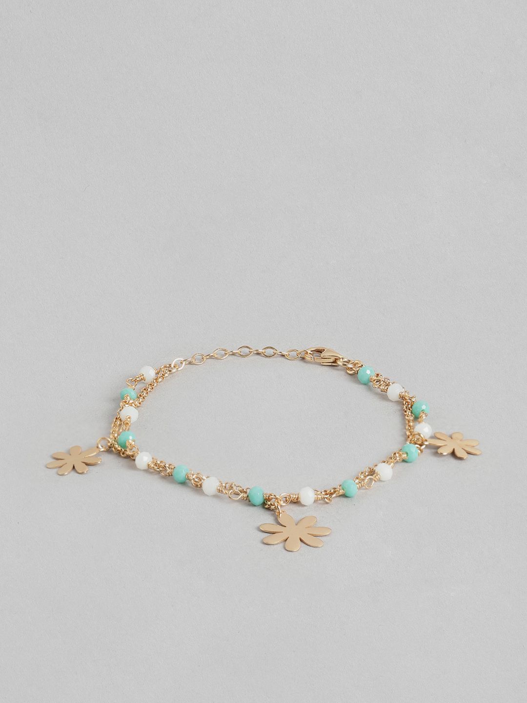 Carlton London Women Gold-Toned & Turquoise Blue Brass Gold-Plated Charm Bracelet Price in India