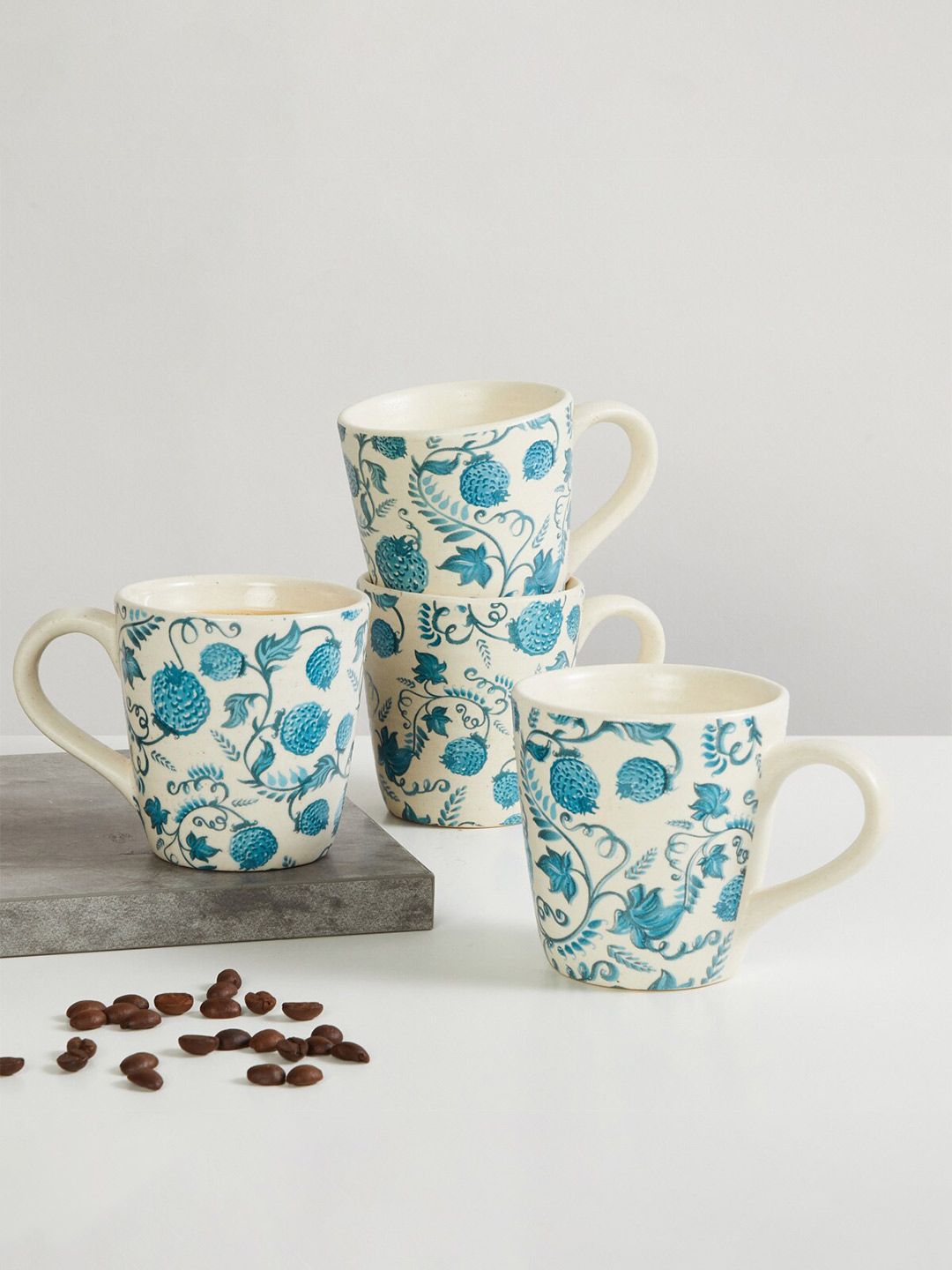 Home Centre White & Blue Floral Printed Stoneware Glossy Mugs Set of Cups and Mugs Price in India