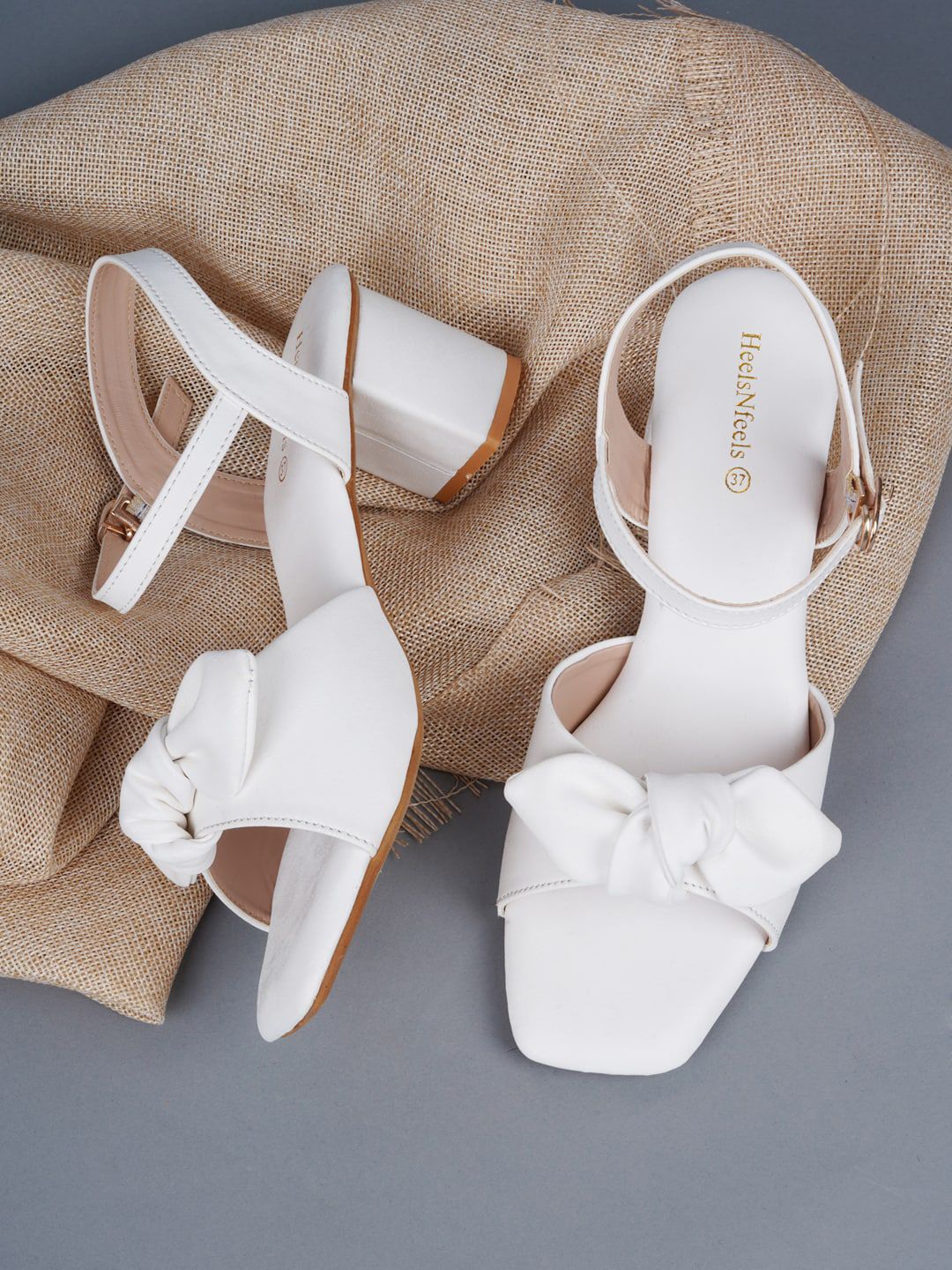 HEELSNFEELS White Embellished Party Block Sandals with Bows Price in India